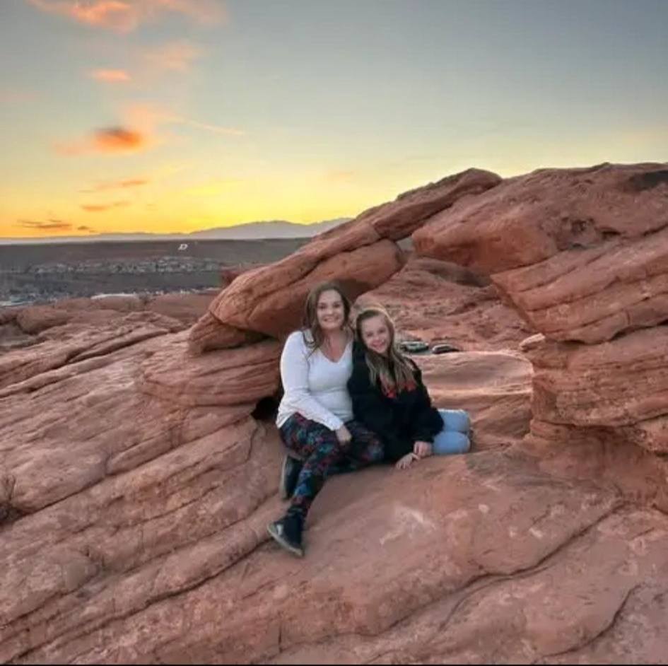 Tawnia McGeehan and Addilyn Smith posing on a rock formation, from a post dated February 17, 2026 | Source: Facebook/Ilea Pacheco