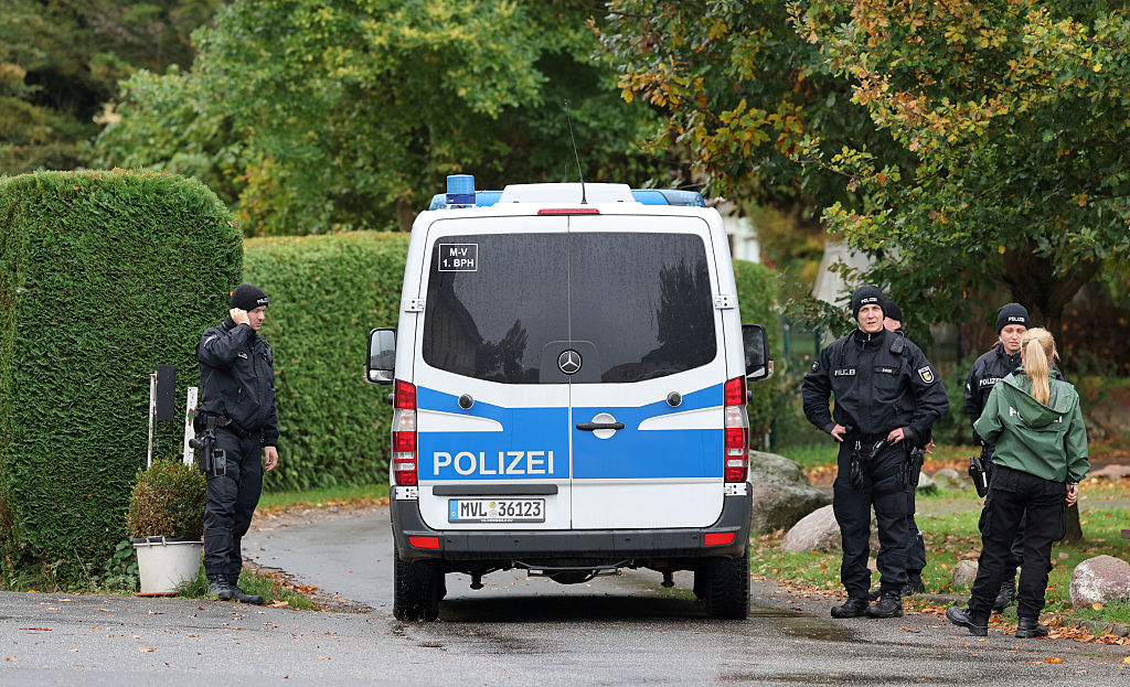 October 14, 2025, Mecklenburg-Western Pomerania, Klein Upahl: A police vehicle passes the cordon on the way to the place where the body of a child was found. | Source: Getty Images