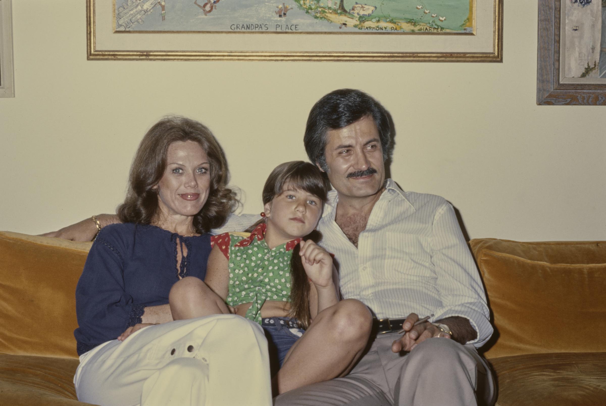 The girl and her parents photographed at their family home in 1975 | Source: Getty Images