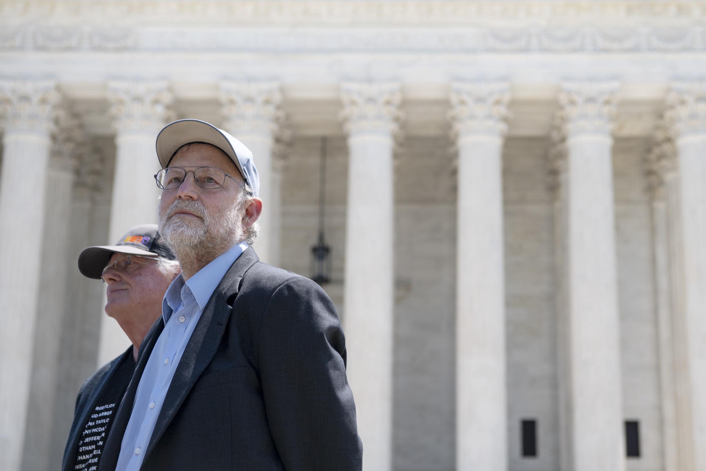 Ben Cohen, left, and Jerry Greenfield, attend an event on police reform and ending qualified immunity outside of the U.S. Supreme Court in Washington on May 20, 2021 | Source: Getty Images