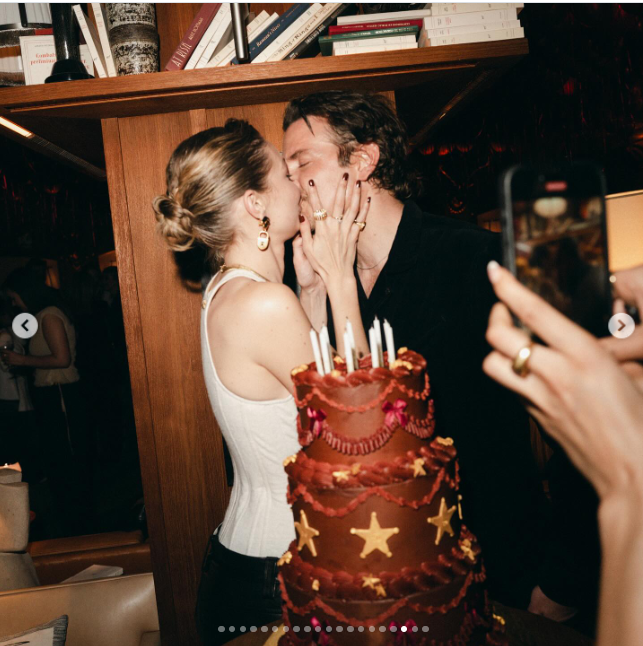 Gigi Hadid and Bradley Cooper share a kiss beside her birthday cake as the couple made their relationship Instagram official in May 2025, offering fans a rare glimpse of their romance during Hadid’s 30th birthday celebration. | Source: Instagram/gigihadid