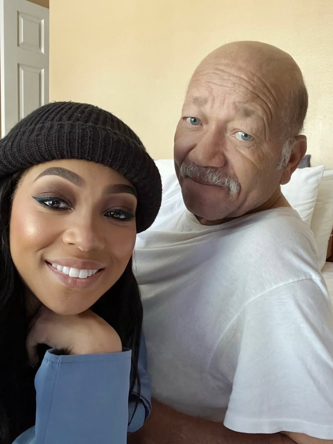 Monica smiling for a photo with her late dad. | Source: Instagram/monicadenise