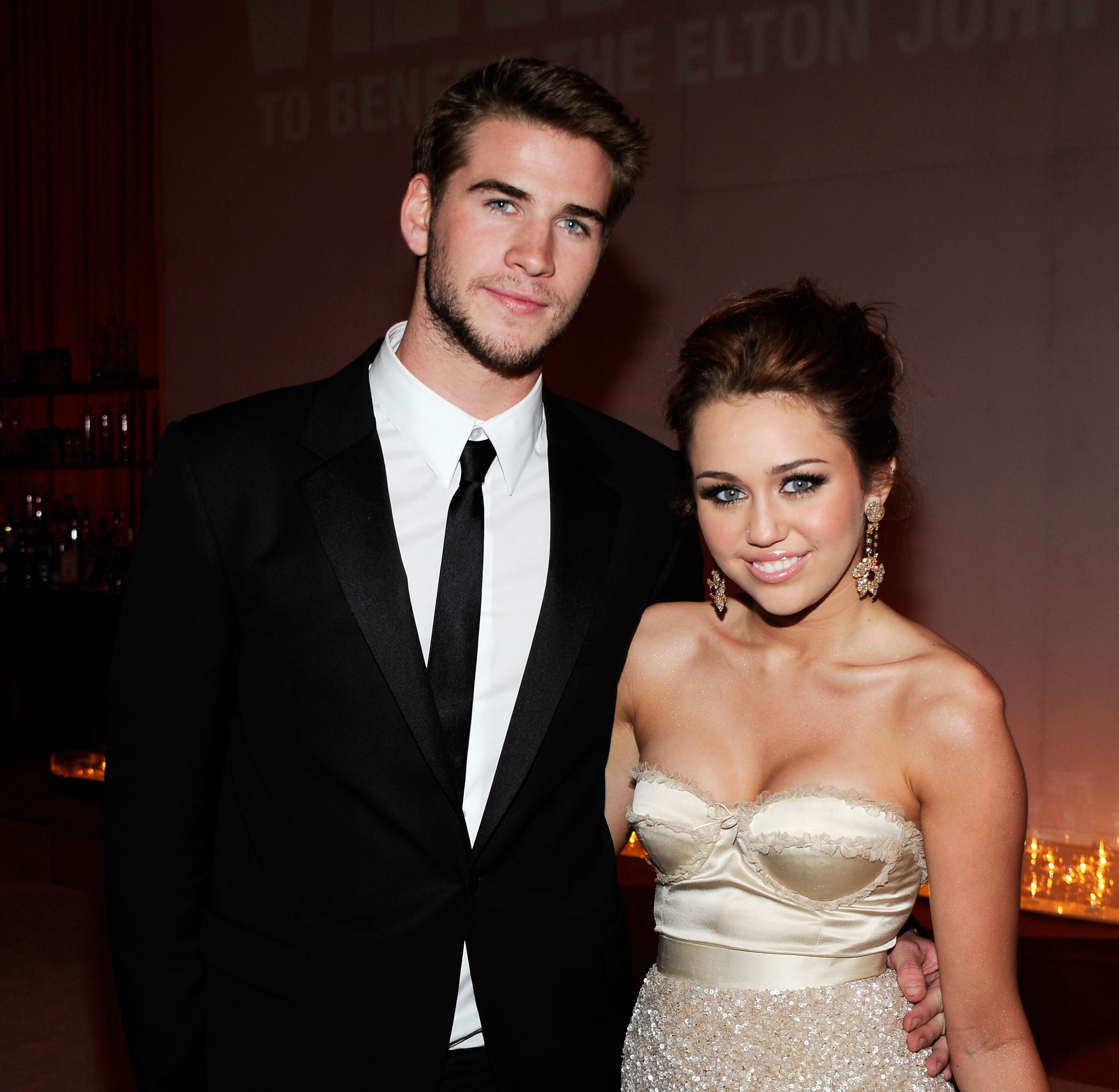 Miley Cyrus and Liam Hemsworth met while filming "The Last Song" in 2009, beginning a relationship that would become one of the most closely followed chapters of her personal life. Their first reported breakup came on August 25, 2010, giving the date an early place in Miley's history. | Source: Getty Images