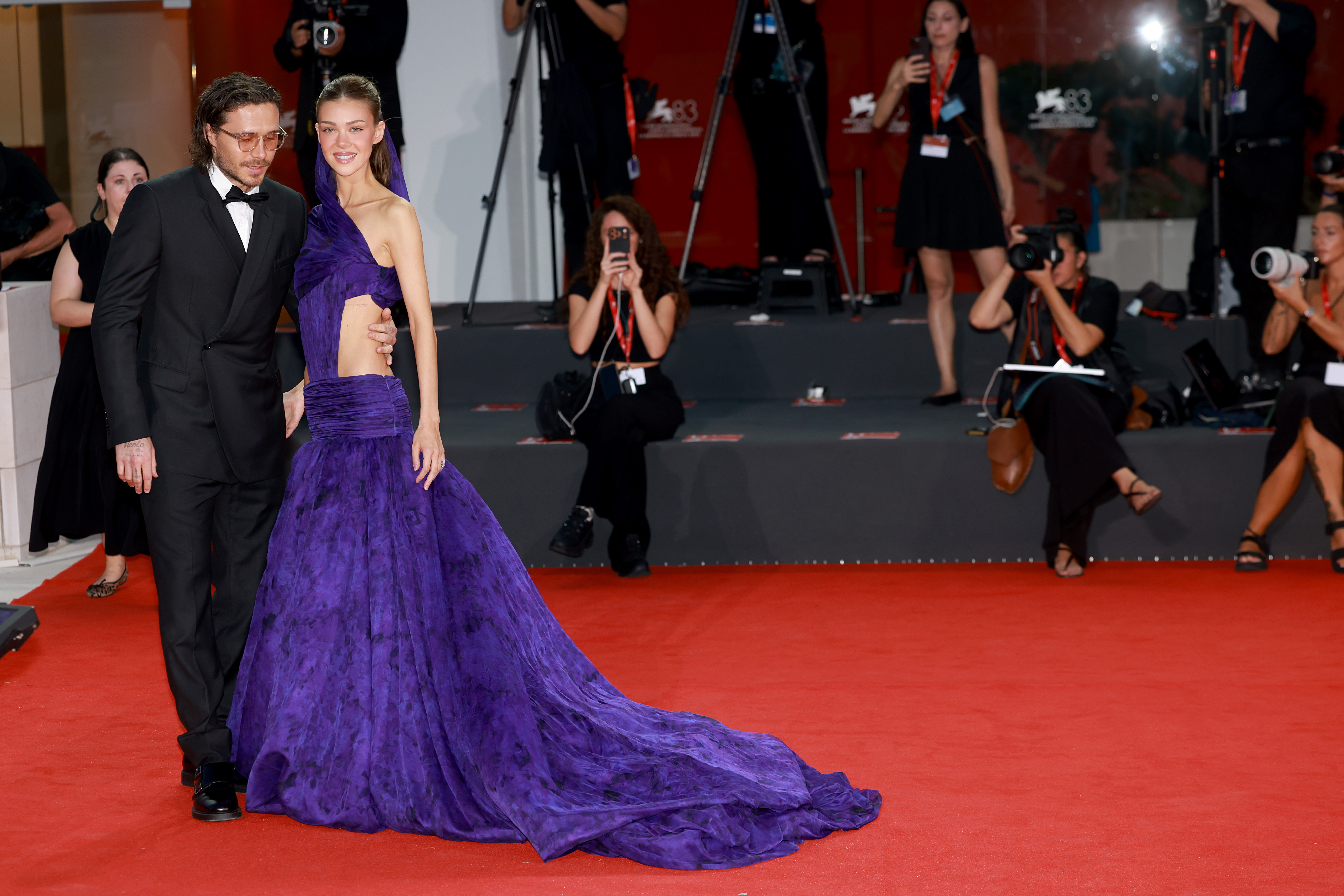 Nicola Peltz Beckham's majestic dress captured plenty of attention, yet onlookers still couldn't help but notice Brooklyn Beckham's disheveled hair. | Source: Getty Images
