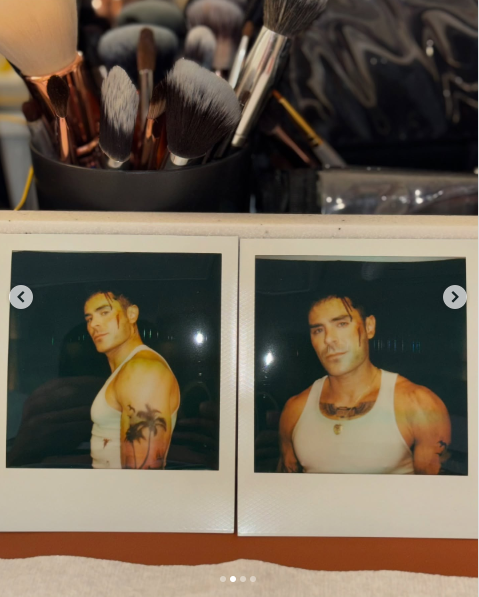 A photo of Zac Efron in a white vest displaying him toned arms from the set of his new movie posted on May 14, 2025 | Source: Instagram/zacefron