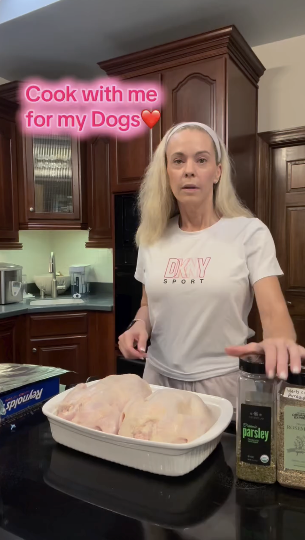 In her kitchen, Kate Gosselin sets raw chickens and spices on the counter. With her hair pulled back in a headband, she reaches for a jar, ready to show viewers how she makes homemade meals for her dogs. | Source: Instagram/kateplusmy8