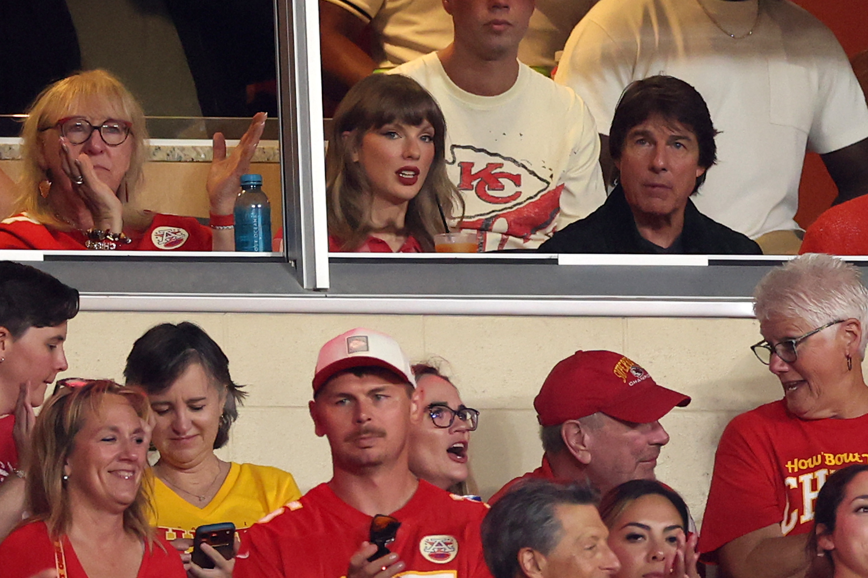 Donna Kelce, Taylor Swift, and Tom Cruise look on from a VIP suite during the Kansas City Chiefs game against the Denver Broncos at Arrowhead Stadium on September 14, 2026. | Source: Getty Images