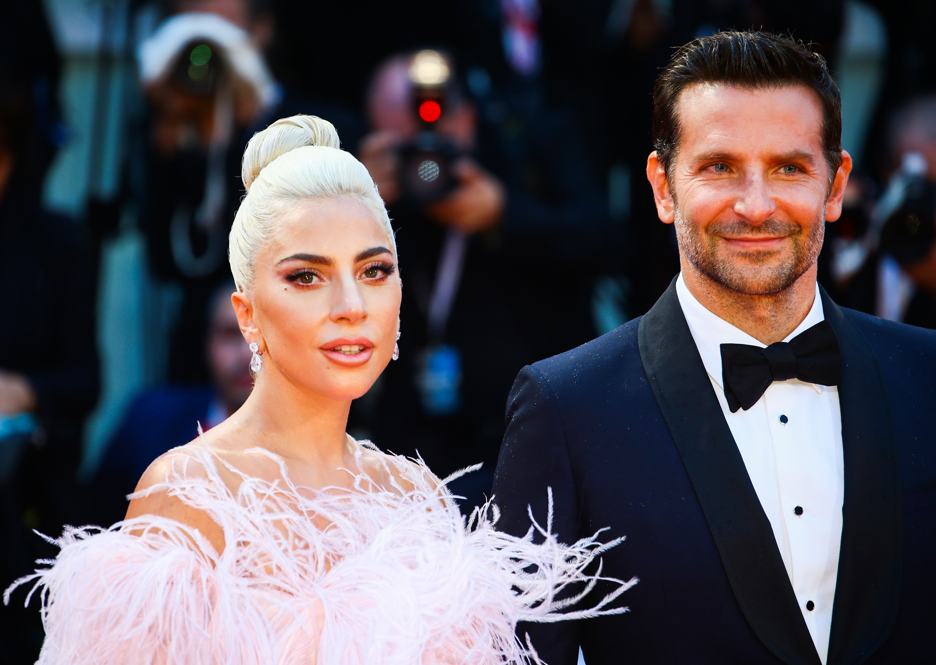 That same day, Cooper showed the same signs of aging, including defined forehead lines and salt-and-pepper stubble, but presents a slightly more debonair and elegant look. He and Lady Gaga were attending the 'A Star Is Born' red carpet premiere during the 75th Venice Film Festival on August 31, 2018, in Venice, Italy.
