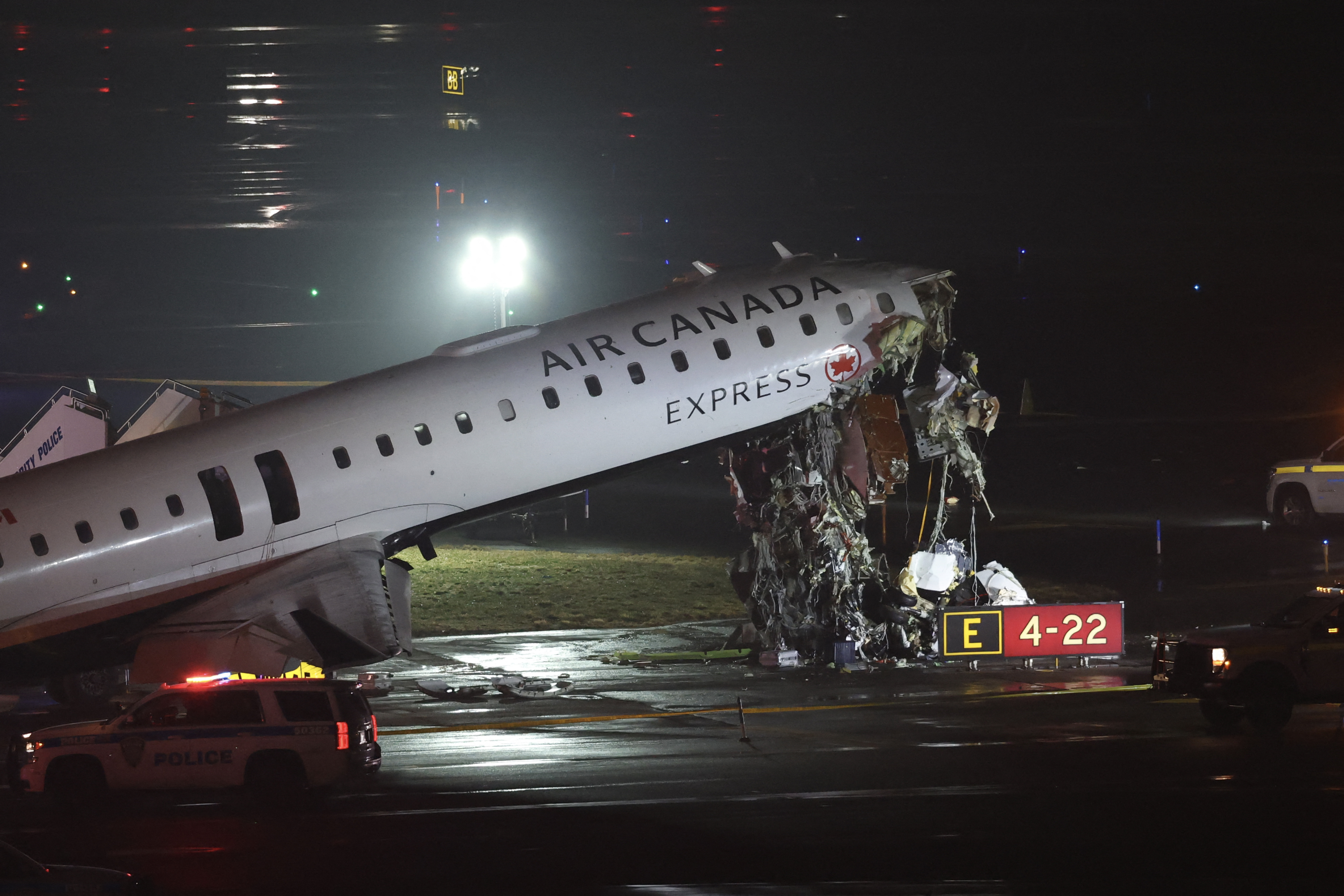 An Air Canada Express CRJ-900 sits on the runway after colliding with a Port Authority fire truck at LaGuardia Airport on March 23, 2026, in New York City | Source: Getty Images