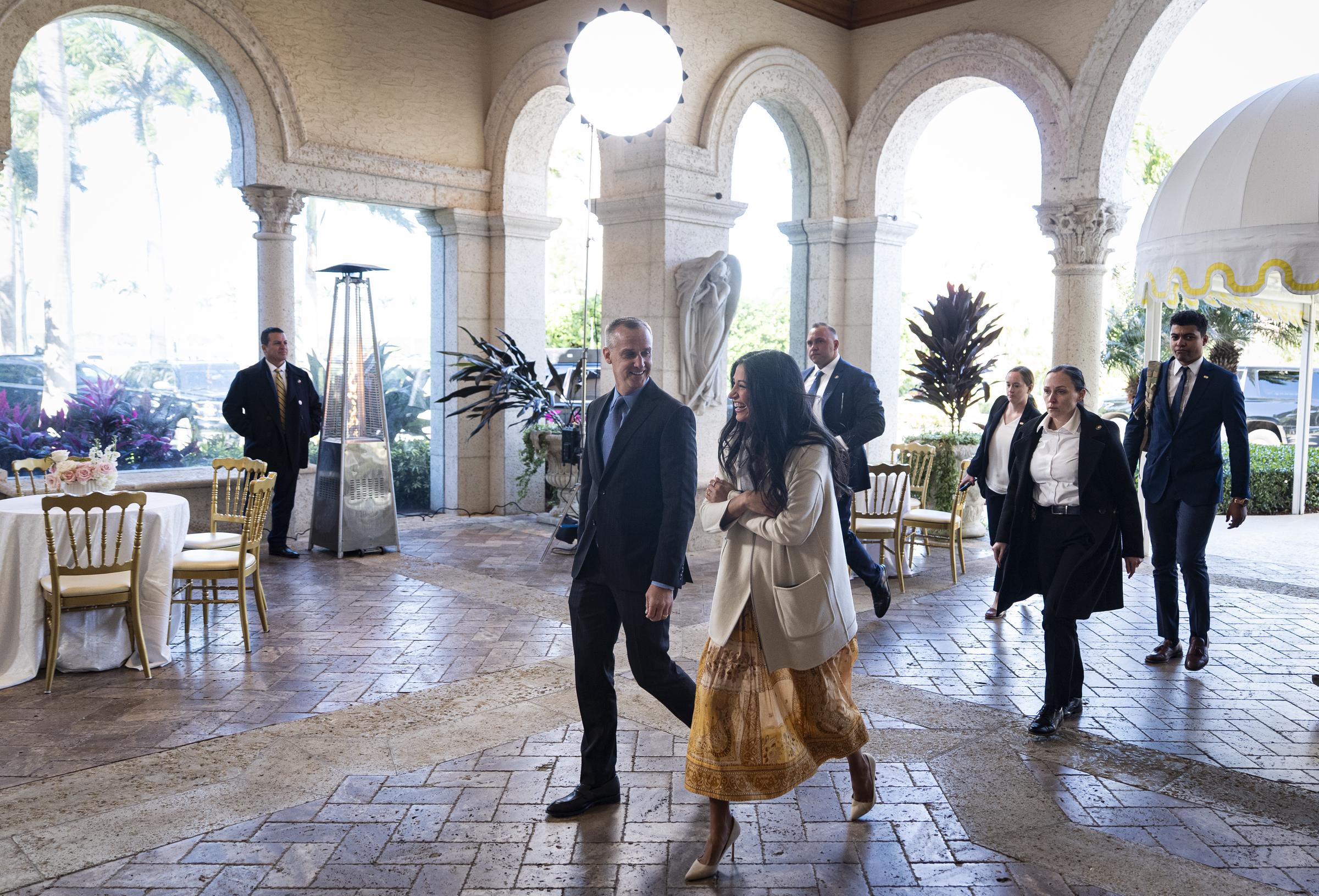 Corey Lewandowski and Kristi Noem arrive at Mar-a-Lago on February 1, 2026 | Source: Getty Images