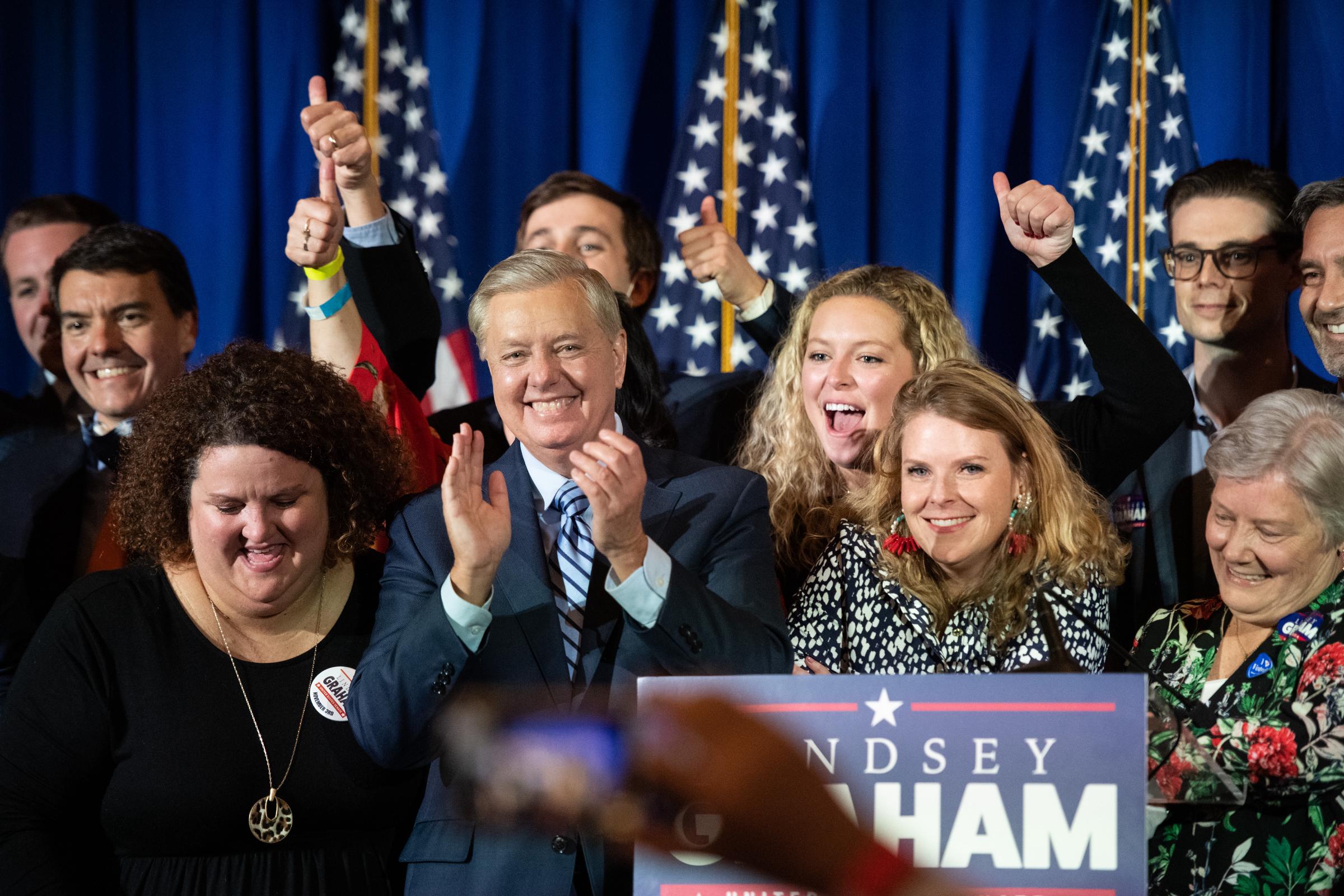Surrounded by cheering supporters on election night, Lindsey Graham celebrates another successful Senate campaign. The victory secured another term for the longtime South Carolina lawmaker after one of the nation's most closely watched races. | Source: Getty Images