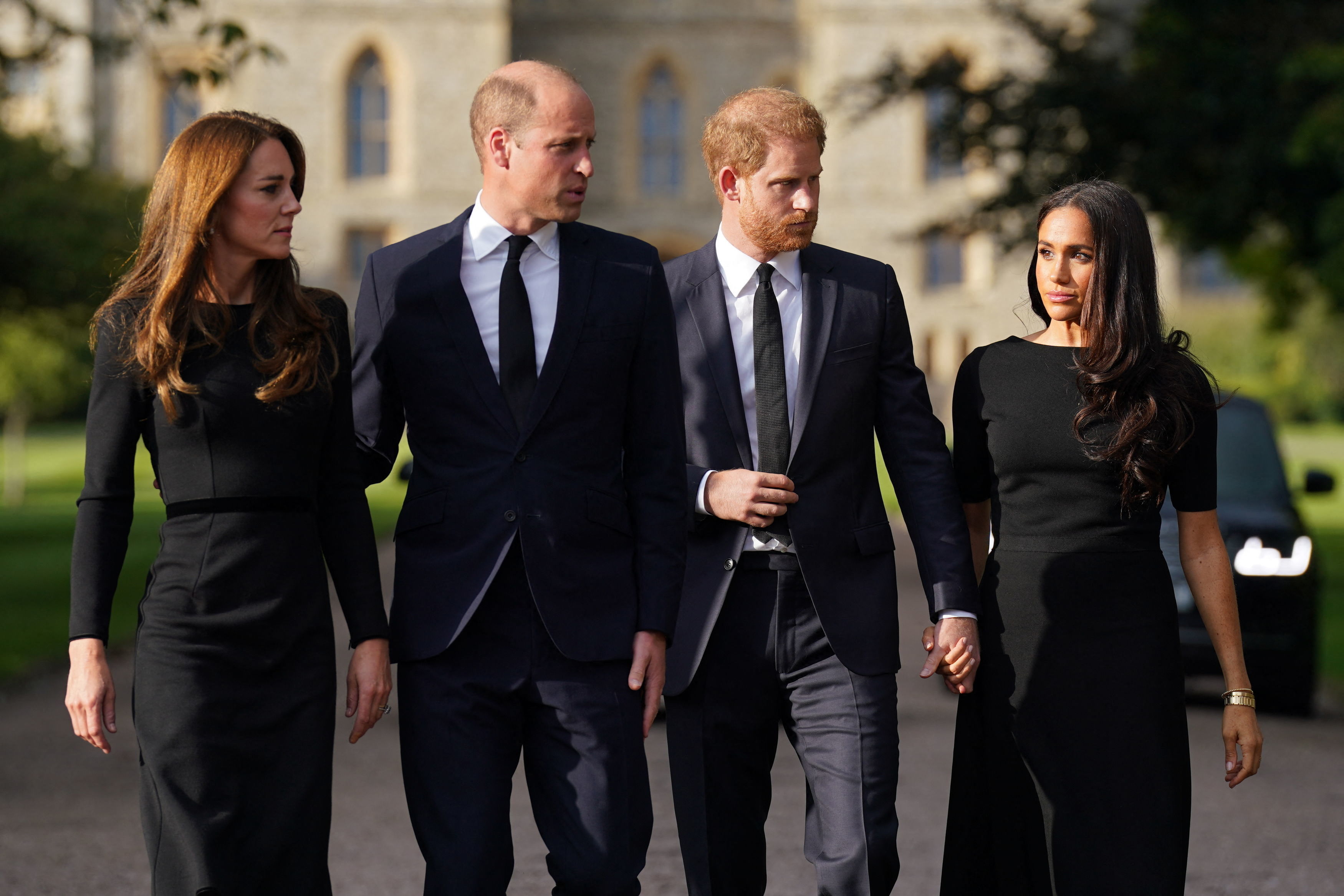 On September 10, 2022, Harry and Meghan joined Prince William and Catherine, Princess of Wales, outside Windsor Castle to greet mourners following Queen Elizabeth II's death. | Source: Getty Images