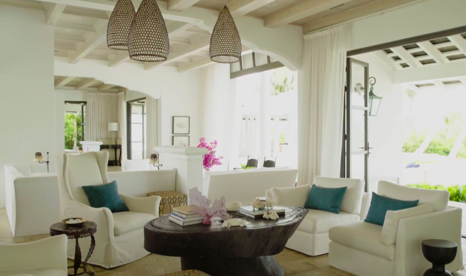 Booth selected pieces intended to give the interiors an informal, naturally assembled appearance. Among the home's distinctive furnishings are organic wood elements and Indonesian lanterns. | Source: YouTube/Architectural Digest