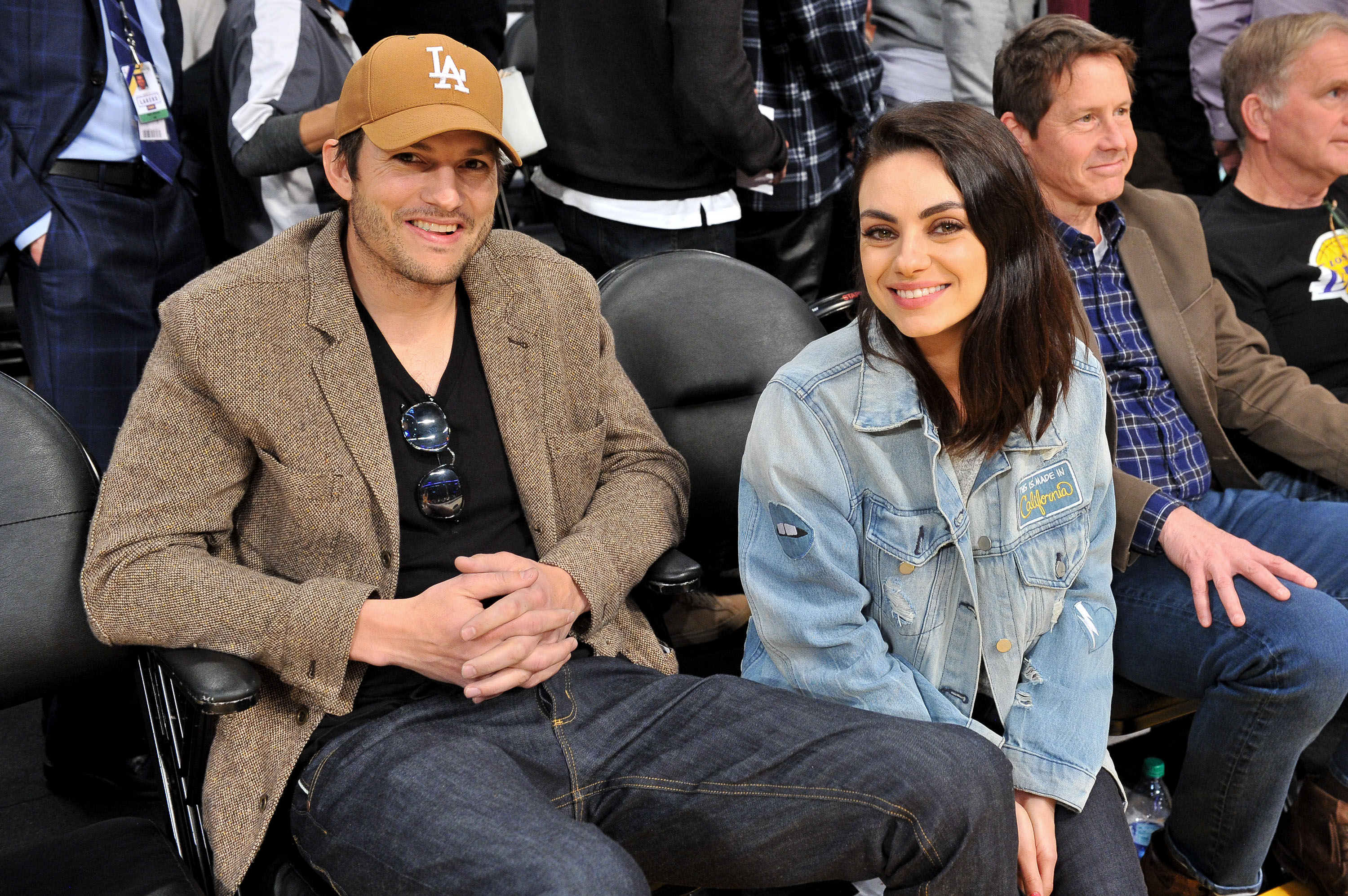 Ashton Kutcher and Mila Kunis at a basketball game between the Los Angeles Lakers and the Philadelphia 76ers at Staples Center on January 29, 2019, in Los Angeles, California. | Source: Getty Images