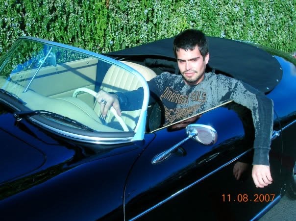 Ross Malinger sits behind the wheel of a classic blue convertible in 2007, a year after his final known TV appearance. The photo offers a fitting glimpse of the new chapter he was building — trading Hollywood cameras for a career in cars.