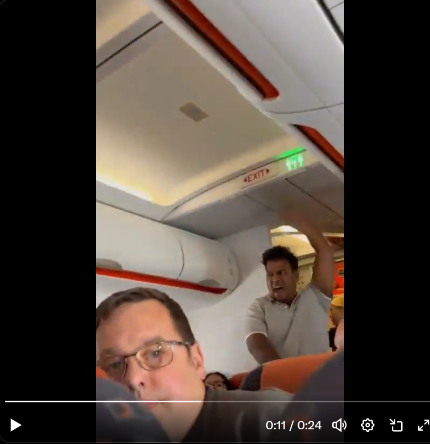 Man pumping his fist and shouting in an EasyJet flight from Luton to Glasgow on July 27, 2025. | Source: x.com/nyssa7