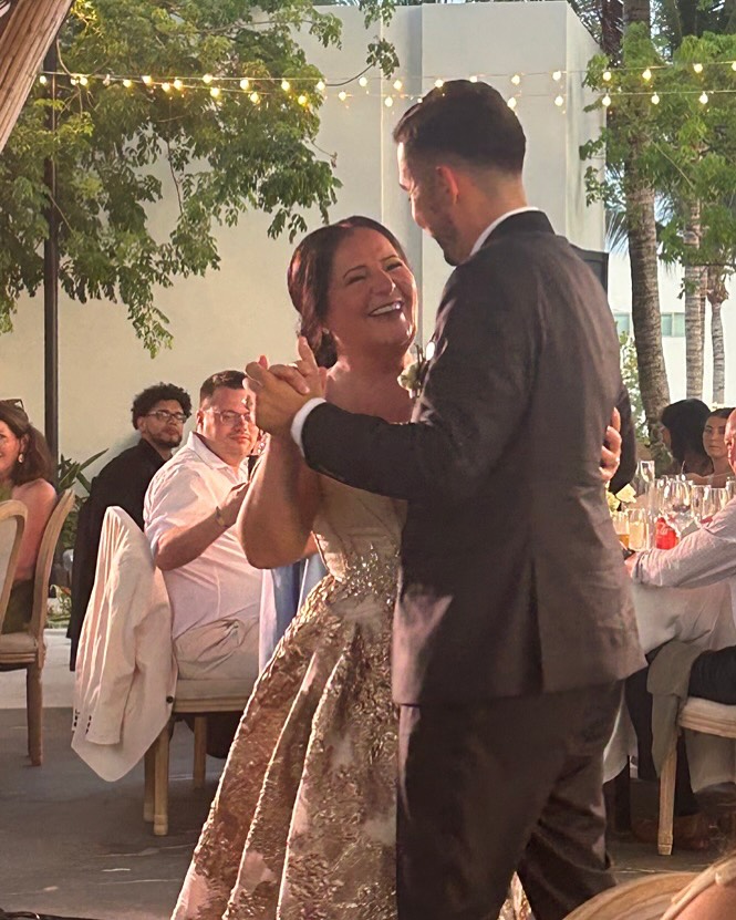 Donike Gocaj dancing with her son in a photo from July 8, 2025 | Source: Facebook/Donika Gocaj