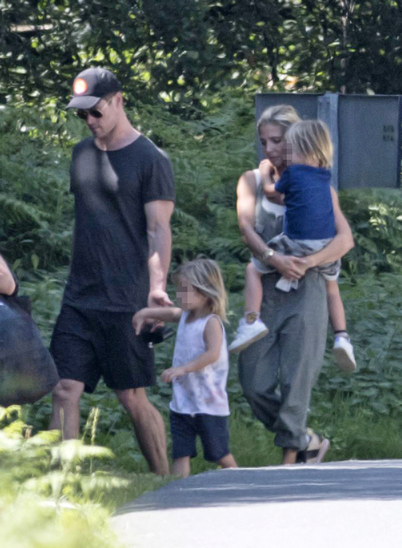 Chris Hemsworth and Elsa Pataky are spotted on a walk with their twin sons, Tristan and Sasha, in San Sebastian, Spain, on July 30, 2018. The couple kept it casual for the family outing, with Chris in a black T-shirt and shorts, and Elsa in a tank top and relaxed trousers.
