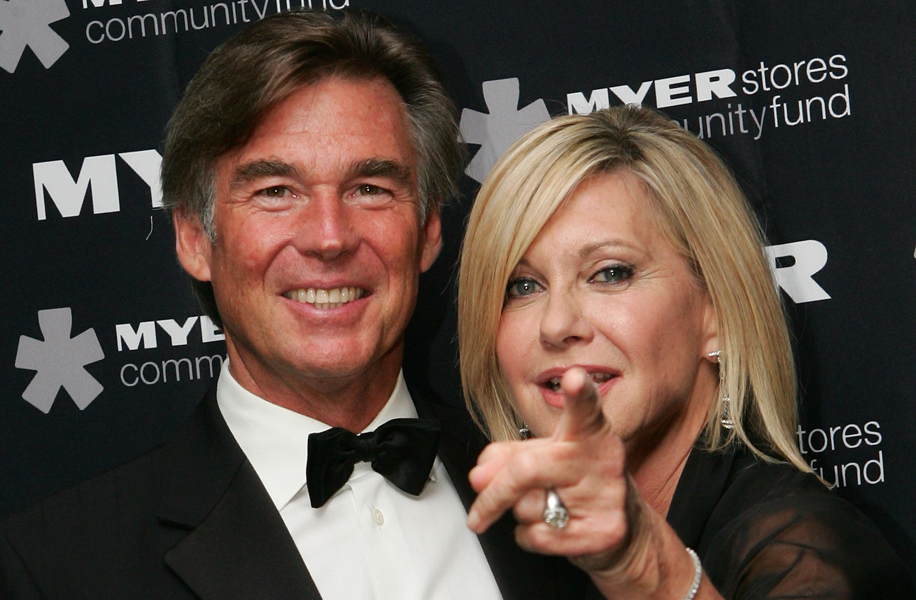 Olivia Newton-John and husband John Easterling arrive at the 2010 Precious Metal Ball in support of the Olivia Newton-John Cancer and Wellness Centre at Peninsula, the Docklands on May 21, 2010 in Melbourne, Australia. | Source: Getty Images