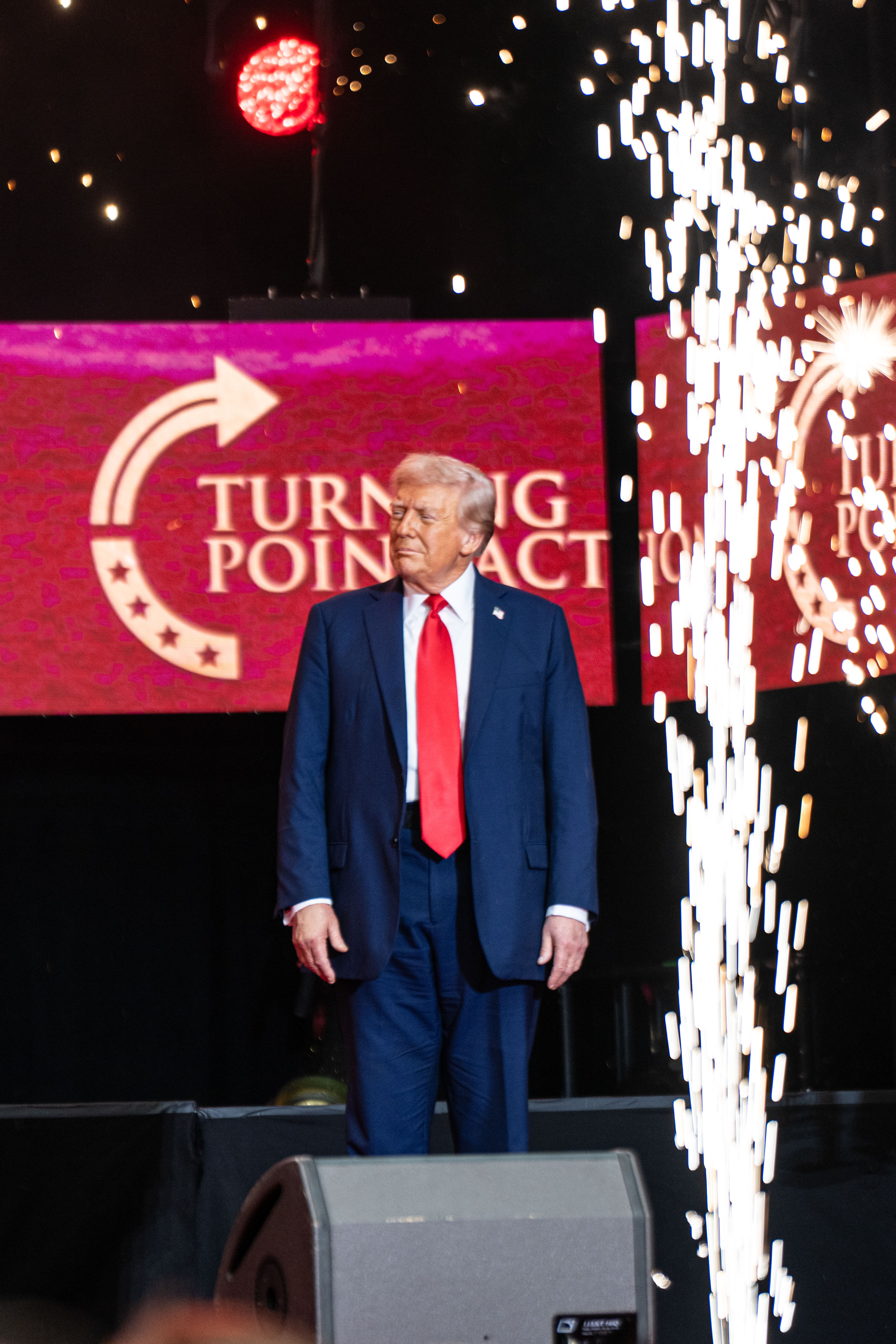 Donald Trump takes the stage during the memorial service for Charlie Kirk at State Farm Stadium on September 21, 2025, in Glendale, Arizona | Source: Getty Images