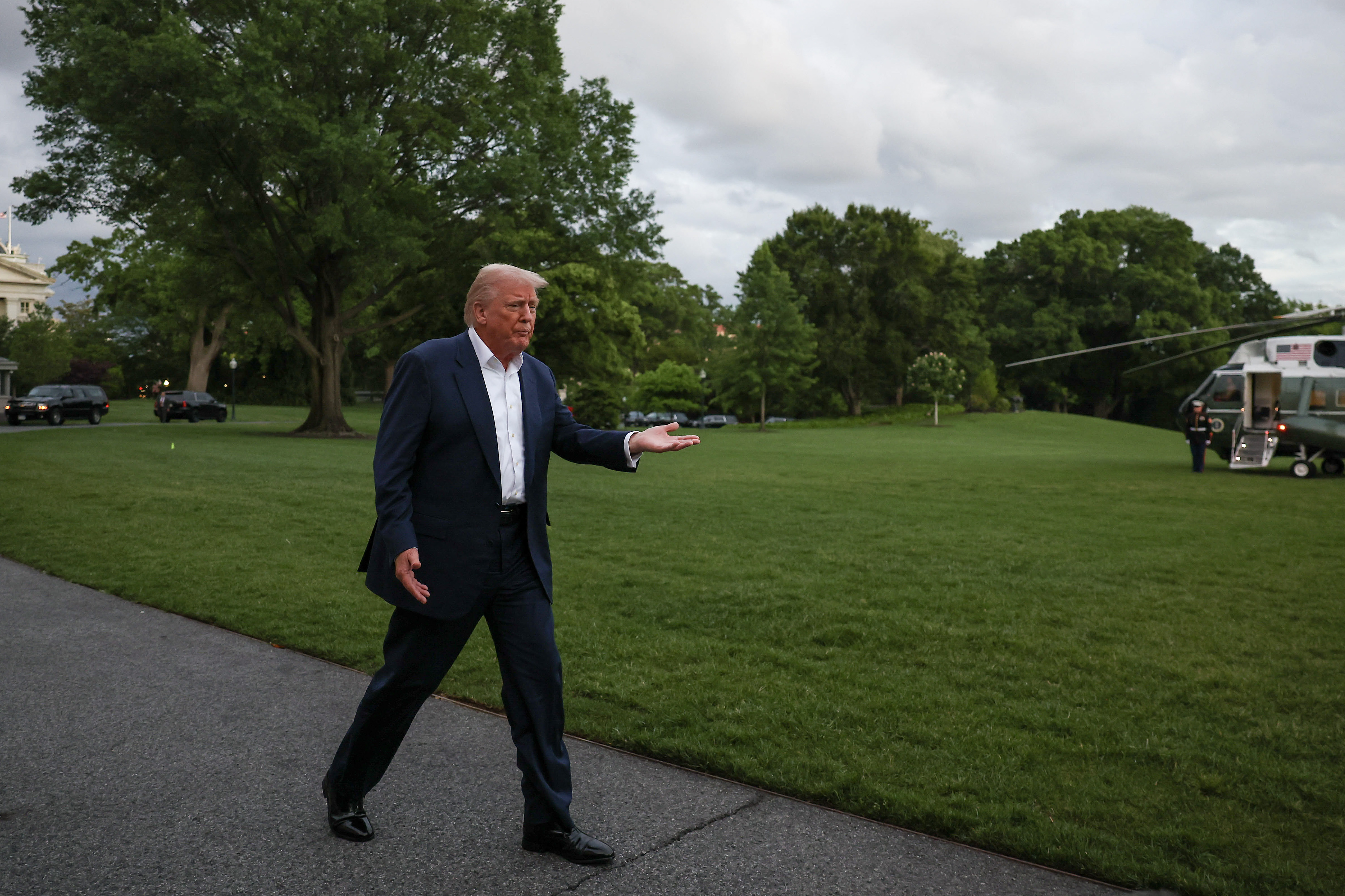 Donald Trump stops to speak to reporters after walking off Marine One on the south lawn of the White House on May 4, 2025 in Washington, DC | Source: Getty Images