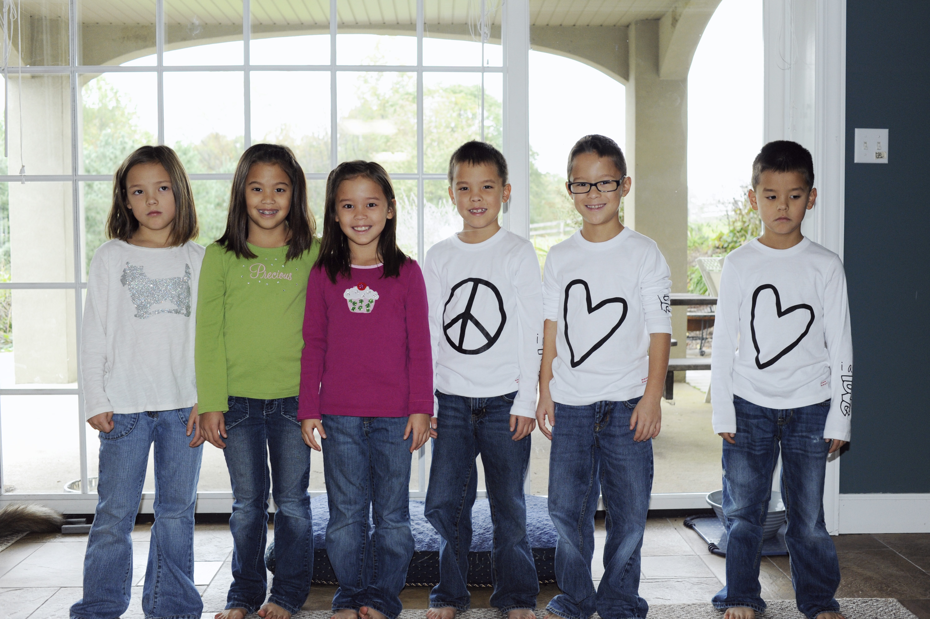 The Gosselin sextuplets appear in a promotional photograph for ABC's "Celebrity Wife Swap." Years later, Collin Gosselin publicly alleged that his mother, Kate, had treated him differently from his siblings during childhood. | Source: Getty Images