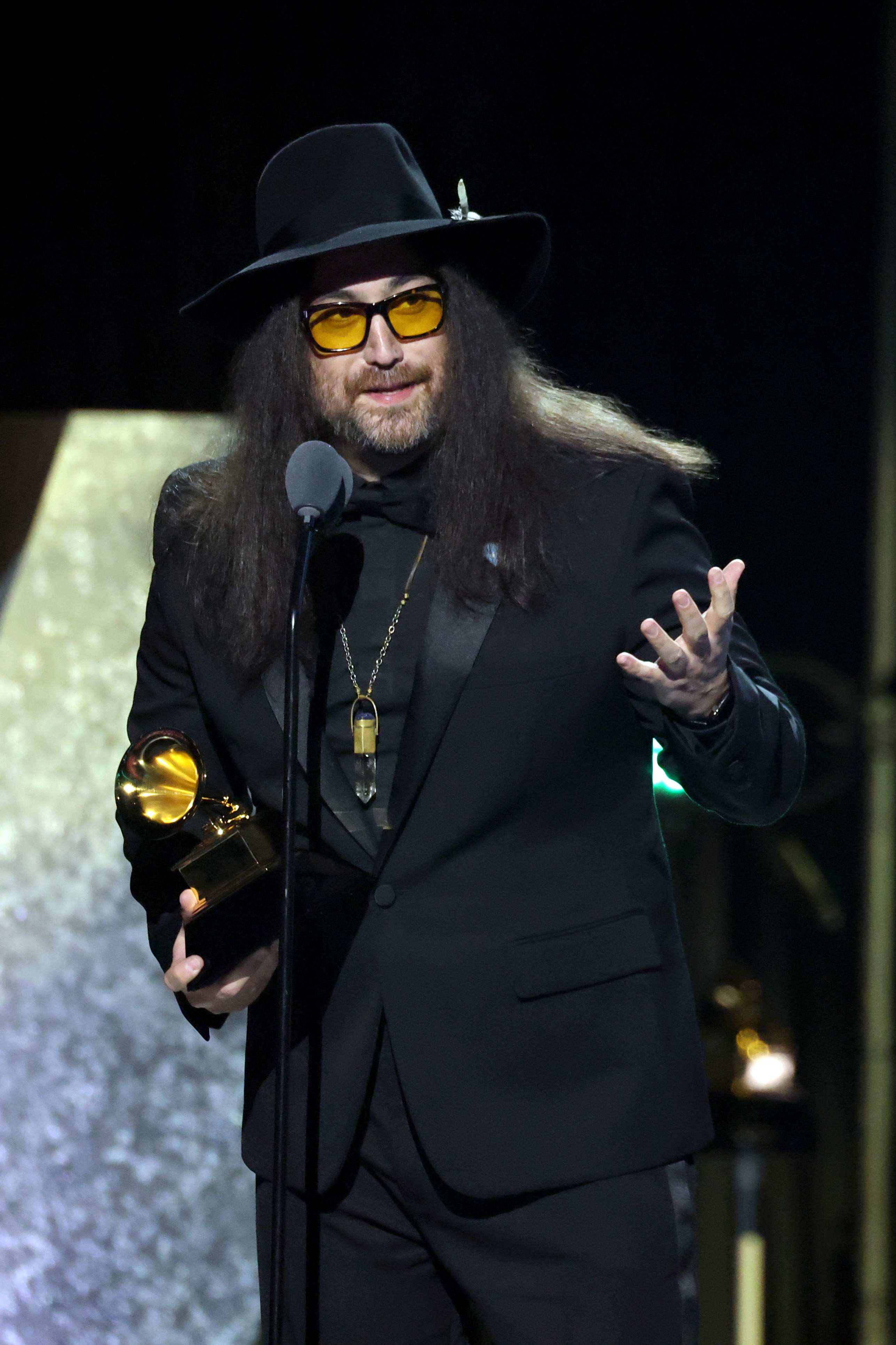 Sean Ono Lennon speaks onstage after receiving the Grammy for ''Mind Games'' during the 67th Grammy Awards Premiere Ceremony at Peacock Theater in Los Angeles on February 2, 2025 | Source: Getty Images