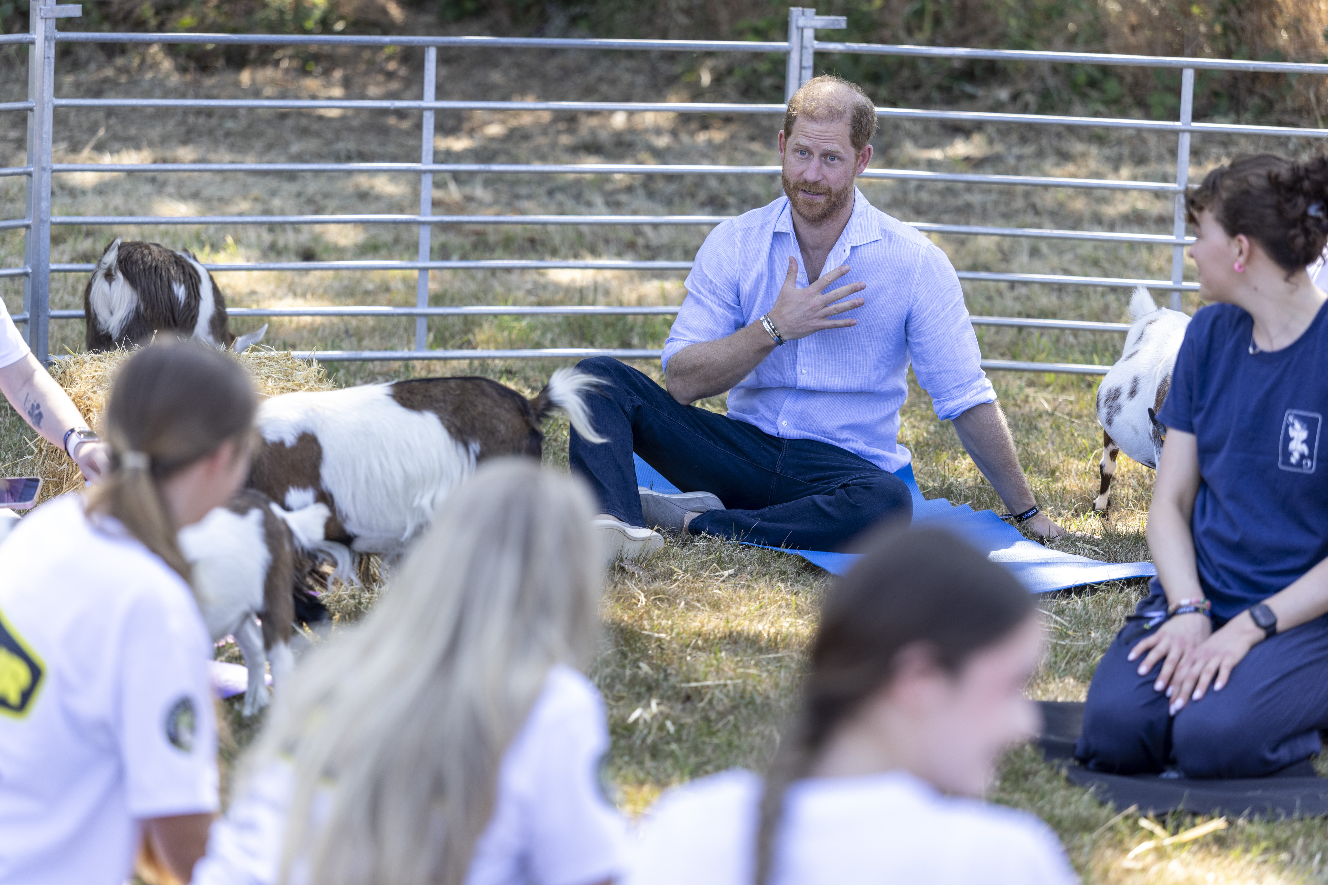 Prince Harry went alone to several events this week. As seen in this photo, he took part in goat yoga during Scotty's Summer Festival at Maxstoke Castle on July 11, 2026, in Birmingham, England. | Source: Getty Images