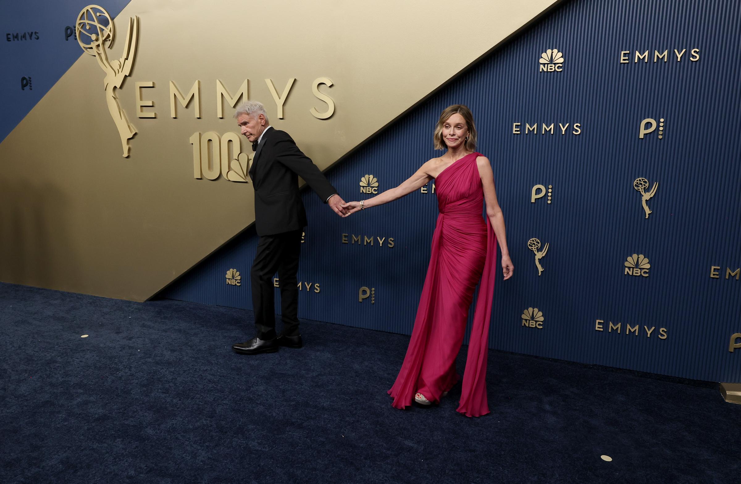 Ford leads Flockhart by the hand as the couple makes their way past photographers. Earlier in 2026, the actor said he does not tell his wife what to do, explaining that decisions such as whether she might appear on "Shrinking" are hers to make.