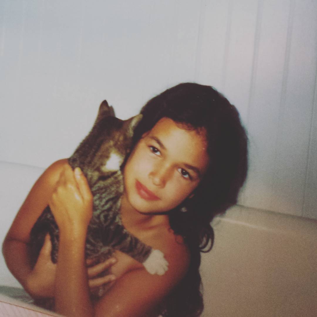 Long before the modeling shots and polished portraits, there were sweet everyday snapshots. They add a human layer to a story often told as a Hollywood disappearance. | Source: Instagram/scarloz