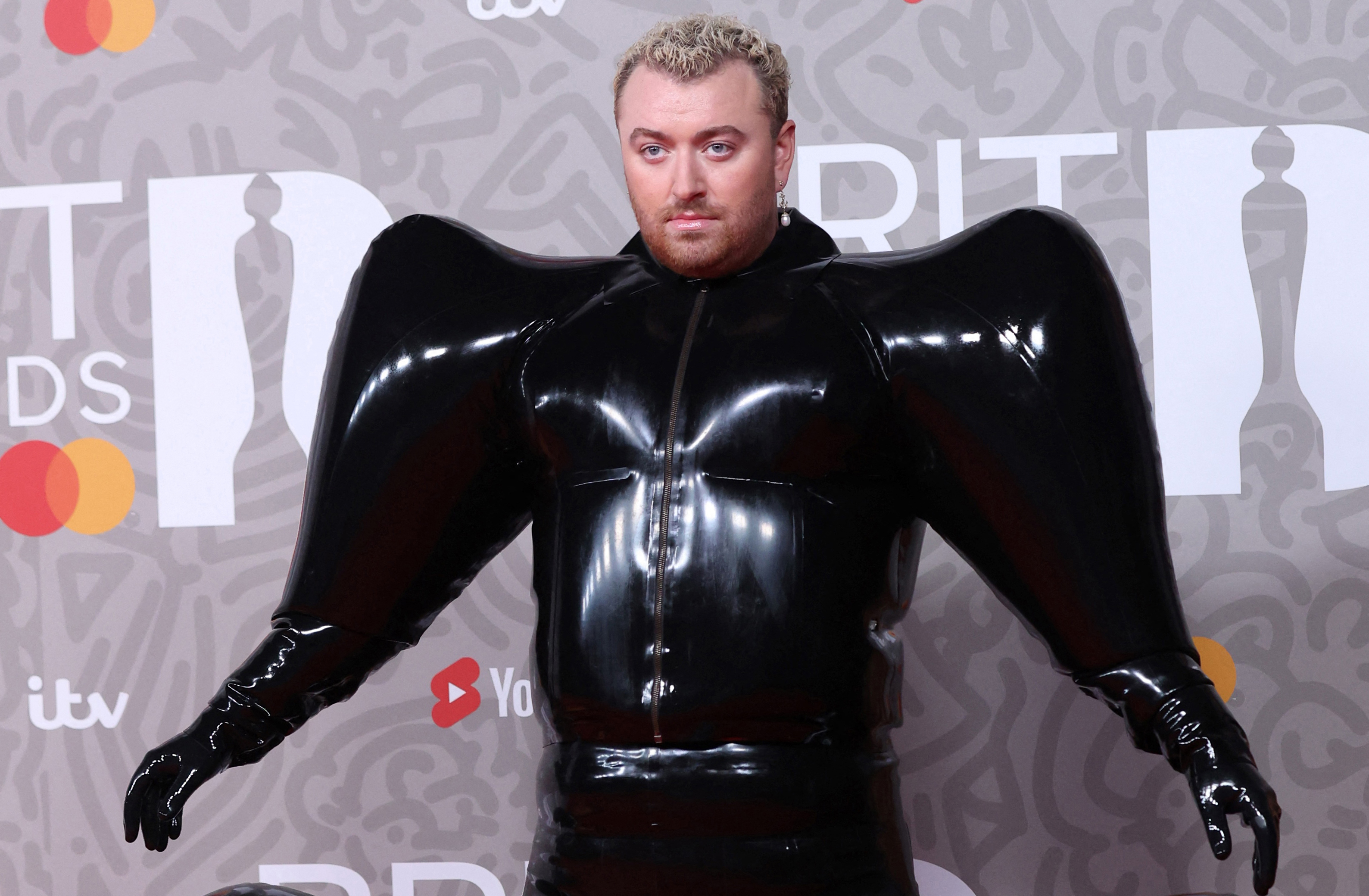 Sam Smith poses on the red carpet upon arrival for the BRIT Awards in London on February 11, 2023 | Source: Getty Images