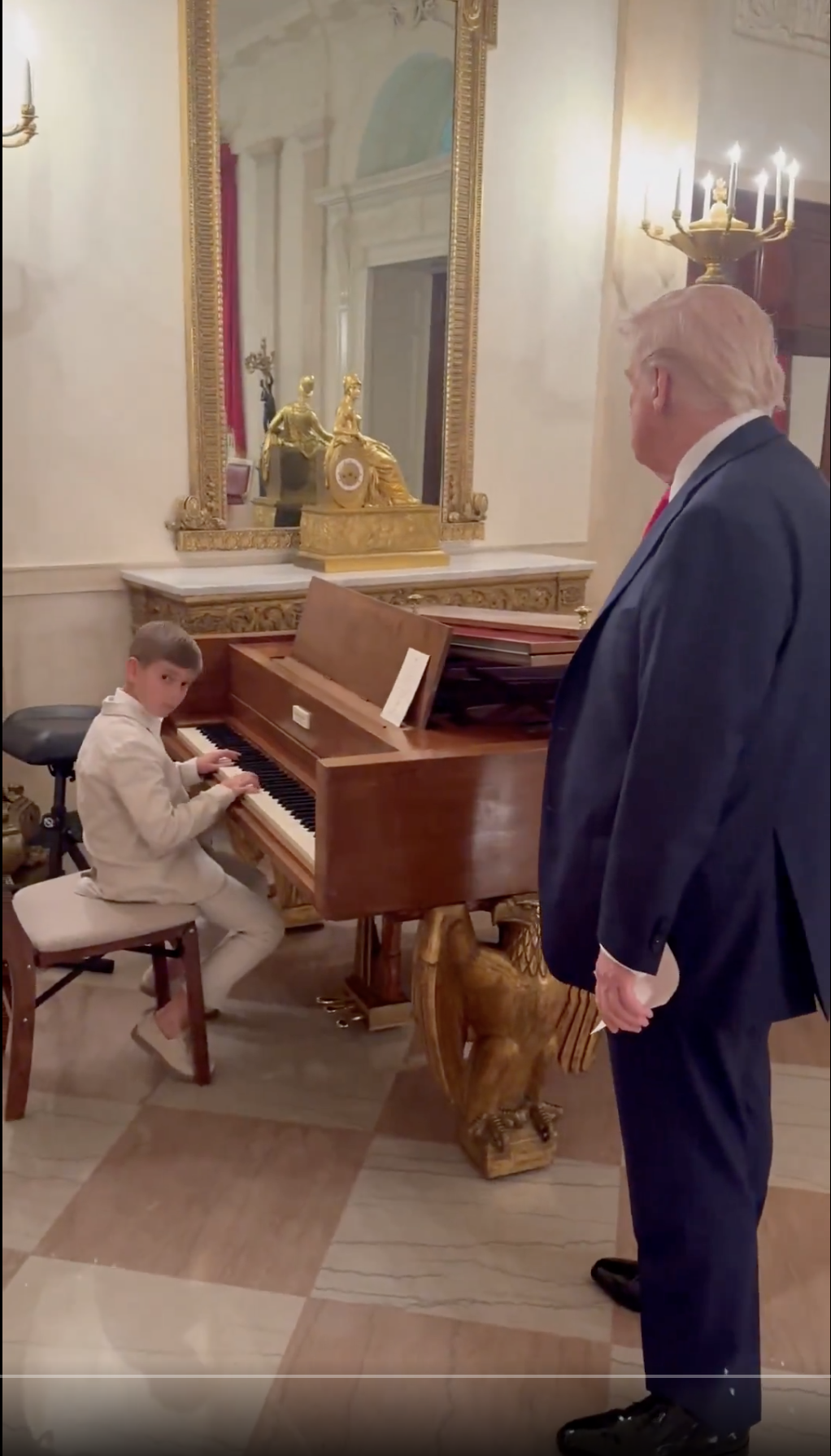 President Donald Trump watches his grandson, Theo James Kushner, playing piano in The White House, in a video dated April 29, 2025 | Source: X/IvankaTrump