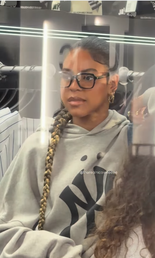 Blue Ivy maintained her laid-back look inside the shop, where her oversized glasses, lengthy braid, and gray hoodie continued to draw attention from fans who appreciated her age-appropriate style. | Source: Instagram/therealnicoleeeeee and fashionbombdaily