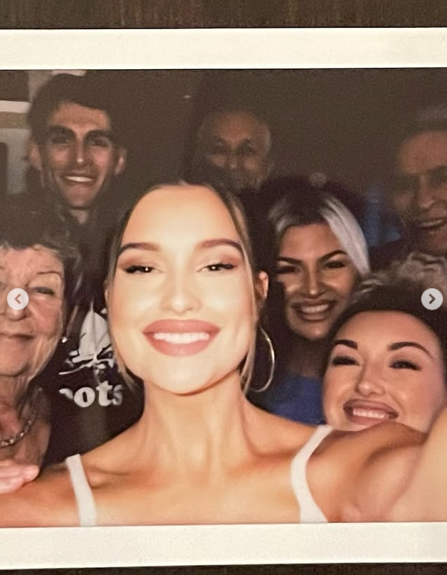 Wood included a group selfie featuring herself and Gerber alongside several other people. It added another shared moment to the collection she posted while looking back on his place in her life. | Source: Instagram/lexiwood
