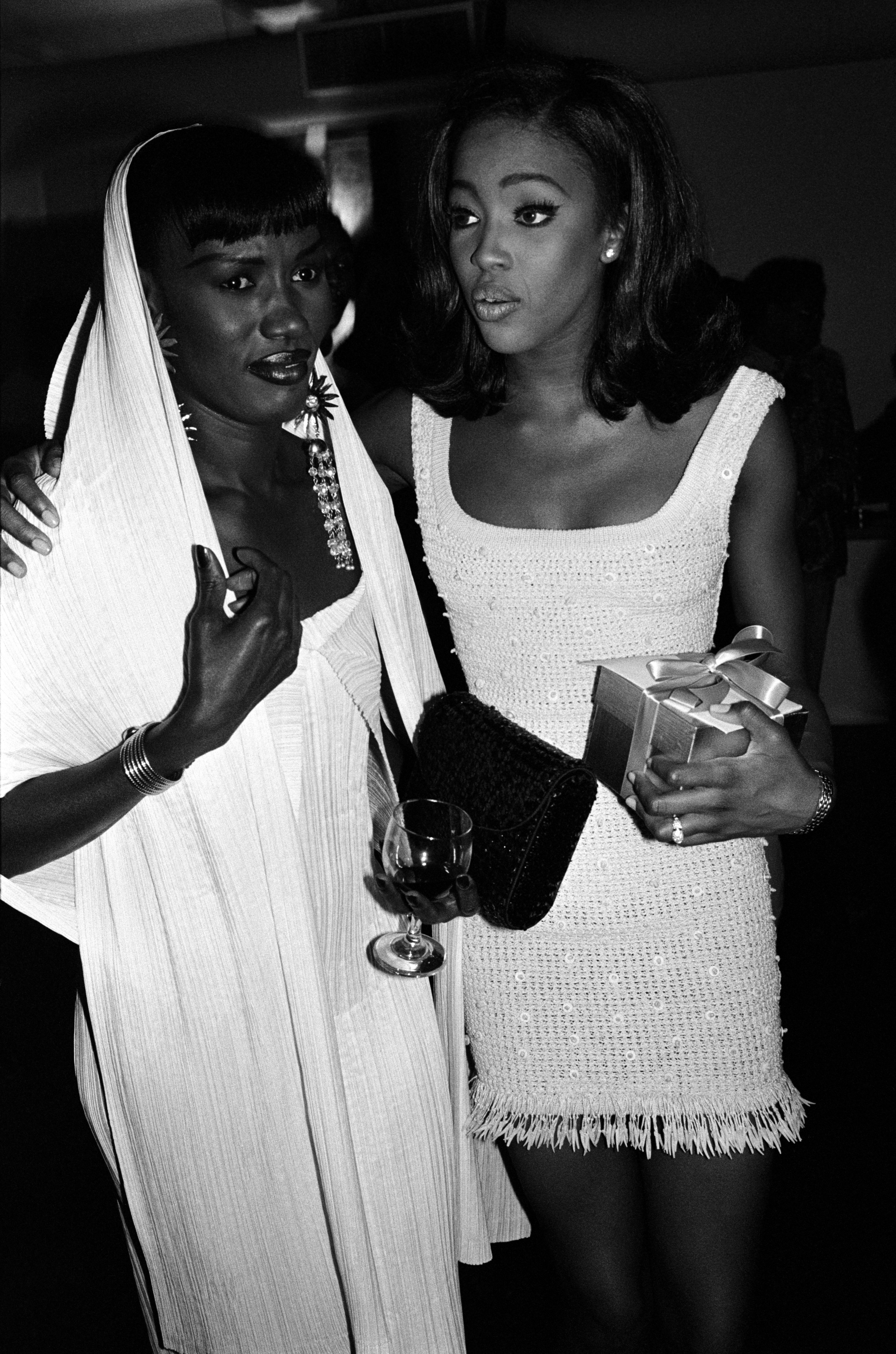 A nostalgic photo of Grace Jones and Naomi Campbell at Campbell's birthday party. | Source: Getty Images