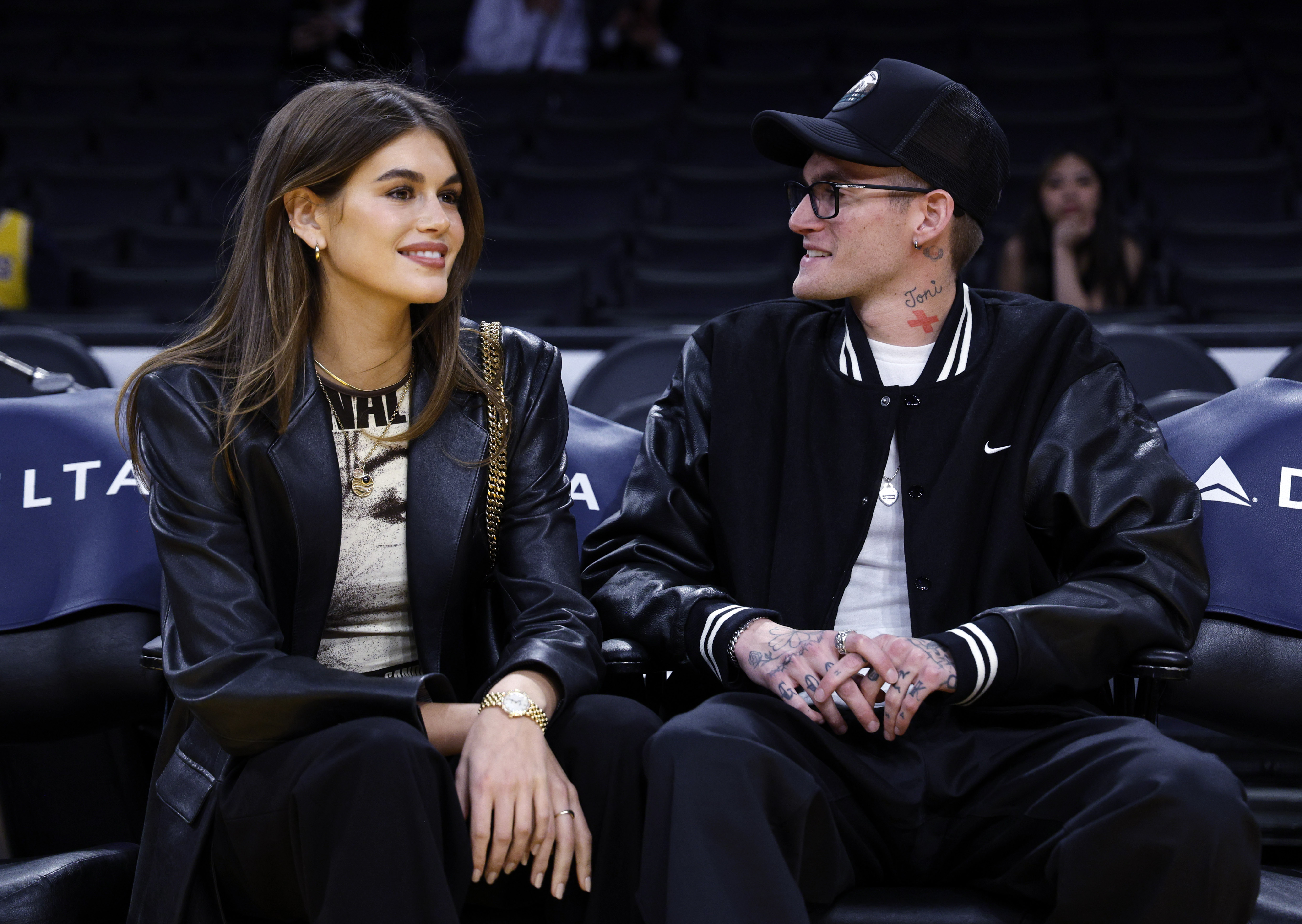 Kaia and Presley attend a Los Angeles Lakers game together on Feb. 23, 2024. Kaia later spoke about how her brother's struggles affected their family and shaped the role she assumed within it. | Source: Getty Images