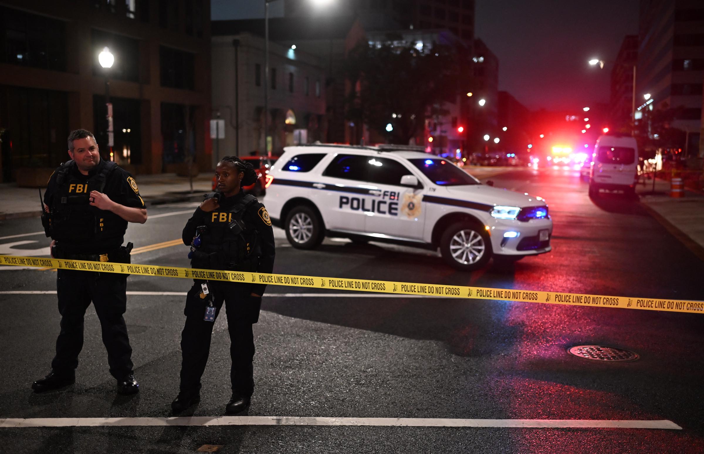 FBI agents cordon off the scene outside the Capital Jewish Museum following a shooting that left two people dead, in Washington, D.C., in the early hours of May 22, 2025. | Source: Getty Images