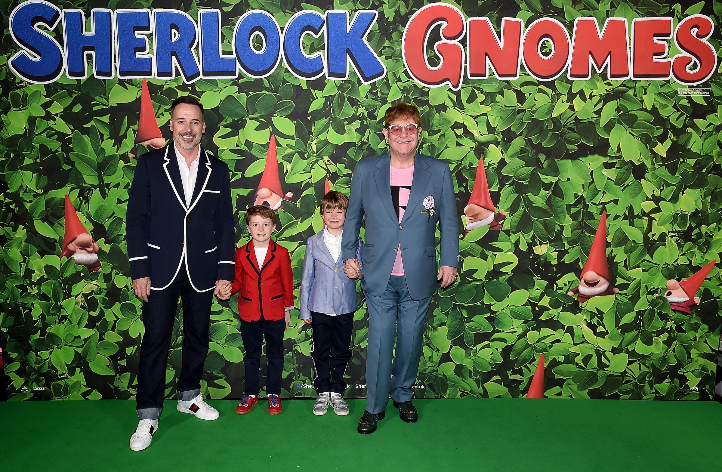 David Furnish and Elton John with their sons, Elijah and Zachary Furnish-John, at the "Sherlock Gnomes" London Family Gala on April 22, 2018, in London, England. | Source: Getty Images