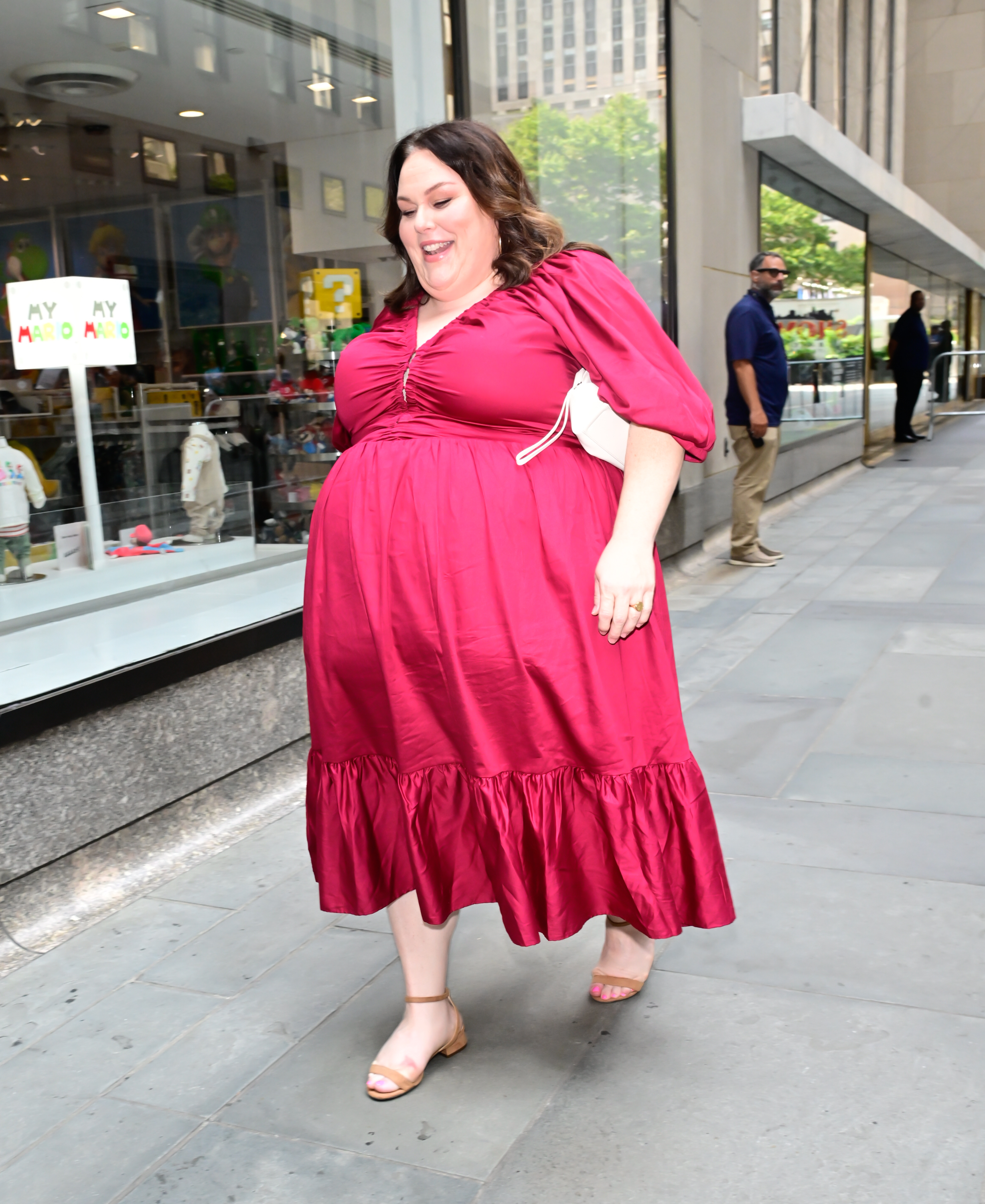 Chrissy Metz was photographed in New York City during her 2026 Broadway run in "& Juliet," wearing a bright pink midi dress. Her role as Angélique marked her Broadway debut, fulfilling a dream she had held since childhood. | Source: Getty Images