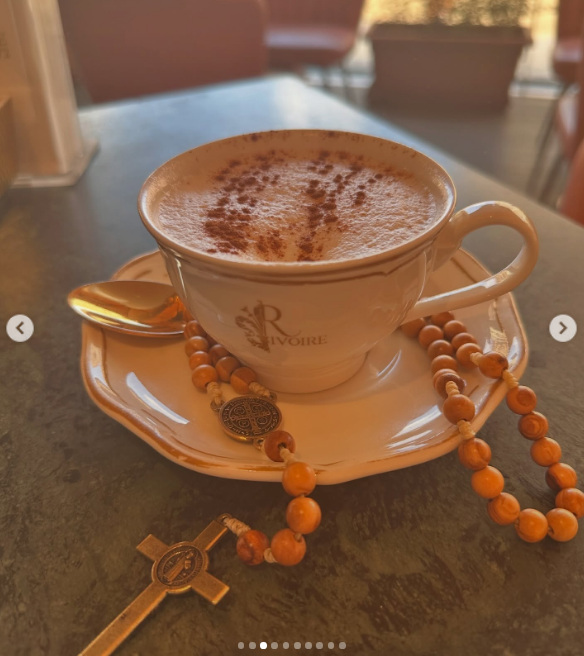 The former model, who was once married to Donald Trump, shared this photo of a cappuccino with a rosary in a carrousel posted on August 4, 2026. | Source: Instagram/marlamaples