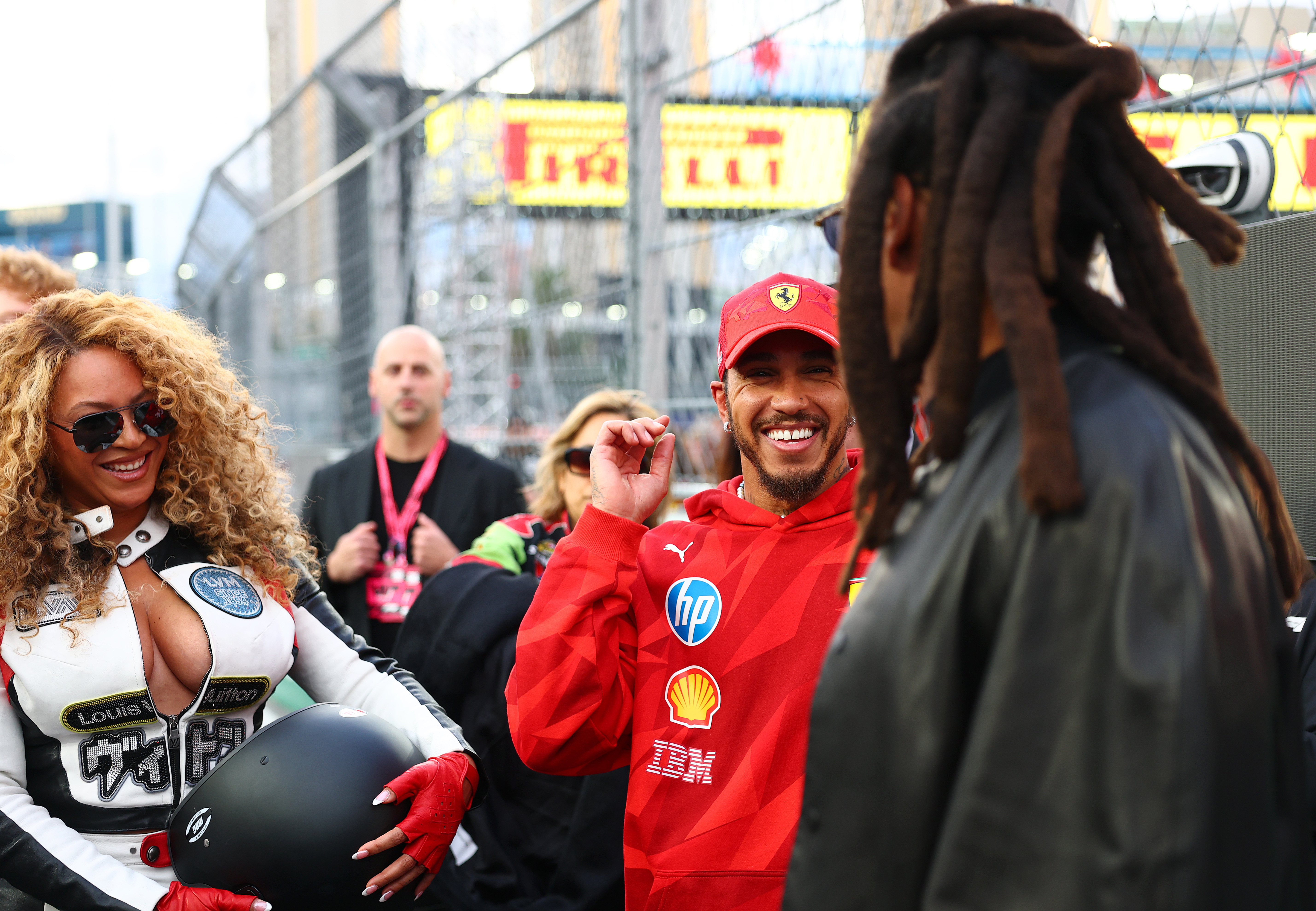 Lewis Hamilton and Scuderia Ferrari talks with Beyonce and Jay-Z on the hot laps grid prior to the F1 Grand Prix of Las Vegas in Nevada on November 22, 2025. | Source: Getty Images