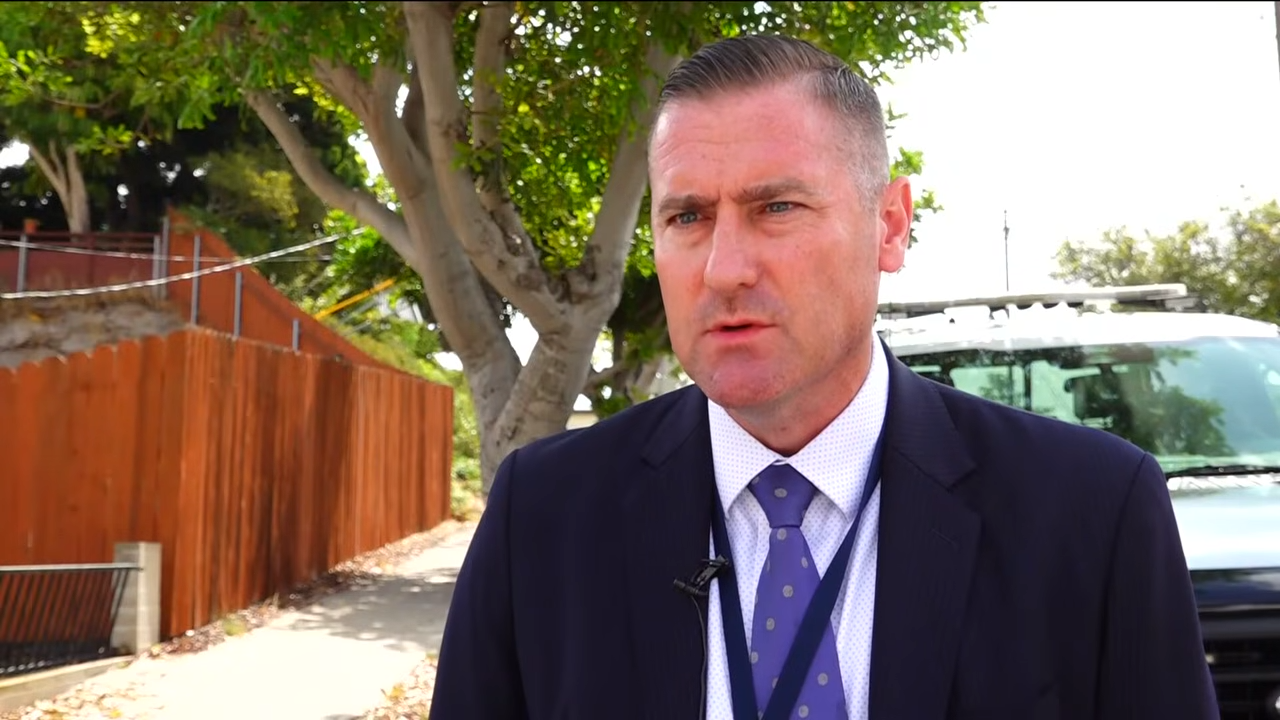 A San Diego police official speaks near the scene as authorities investigate the deaths of Amy, David, and Mya Voight. | Source: YouTube/FOX 5 San Diego