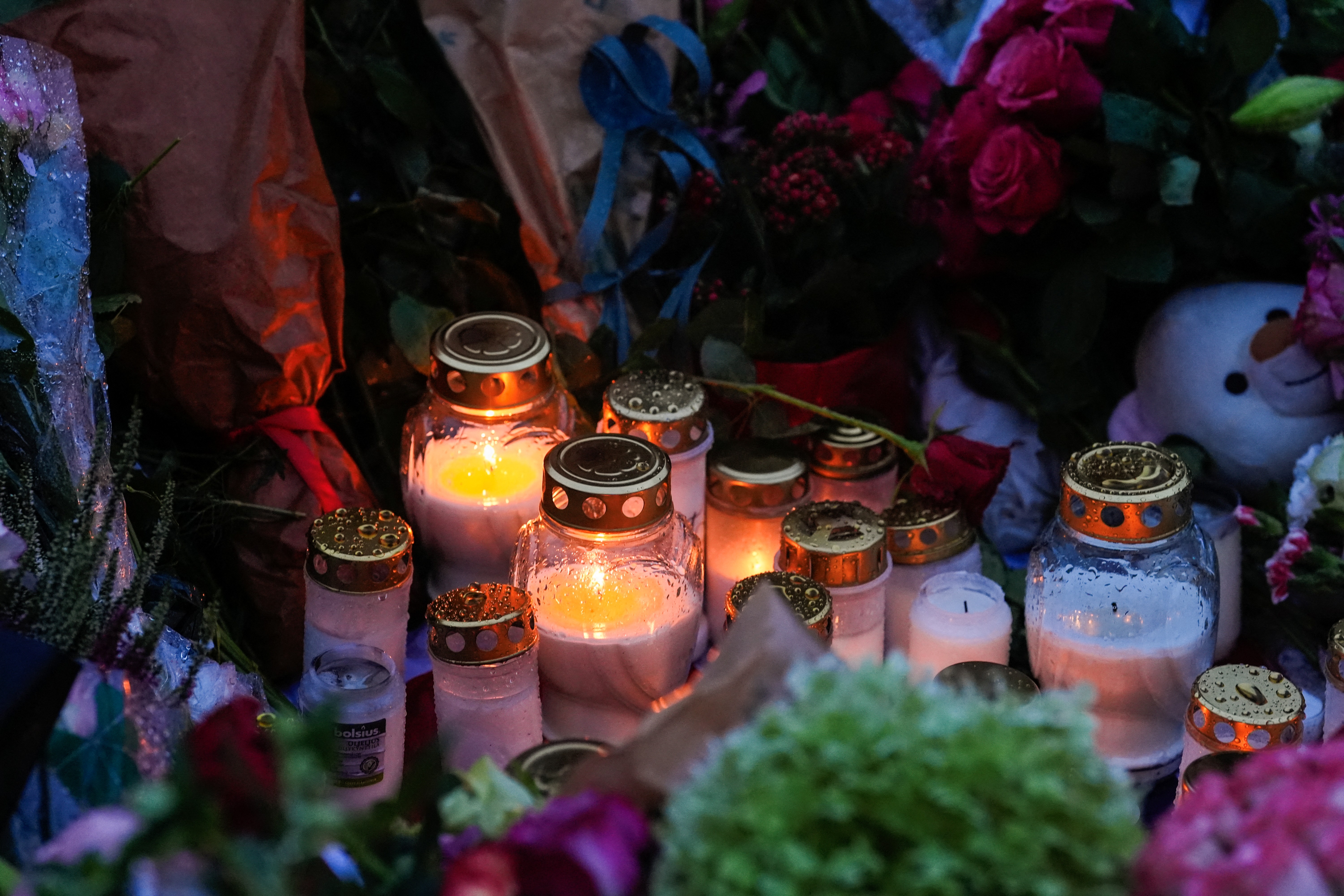 Flowers and candles have been placed in tribute to late King Harald V of Norway at the Palace Square in Oslo on August 28, 2026. | Source: Getty Images