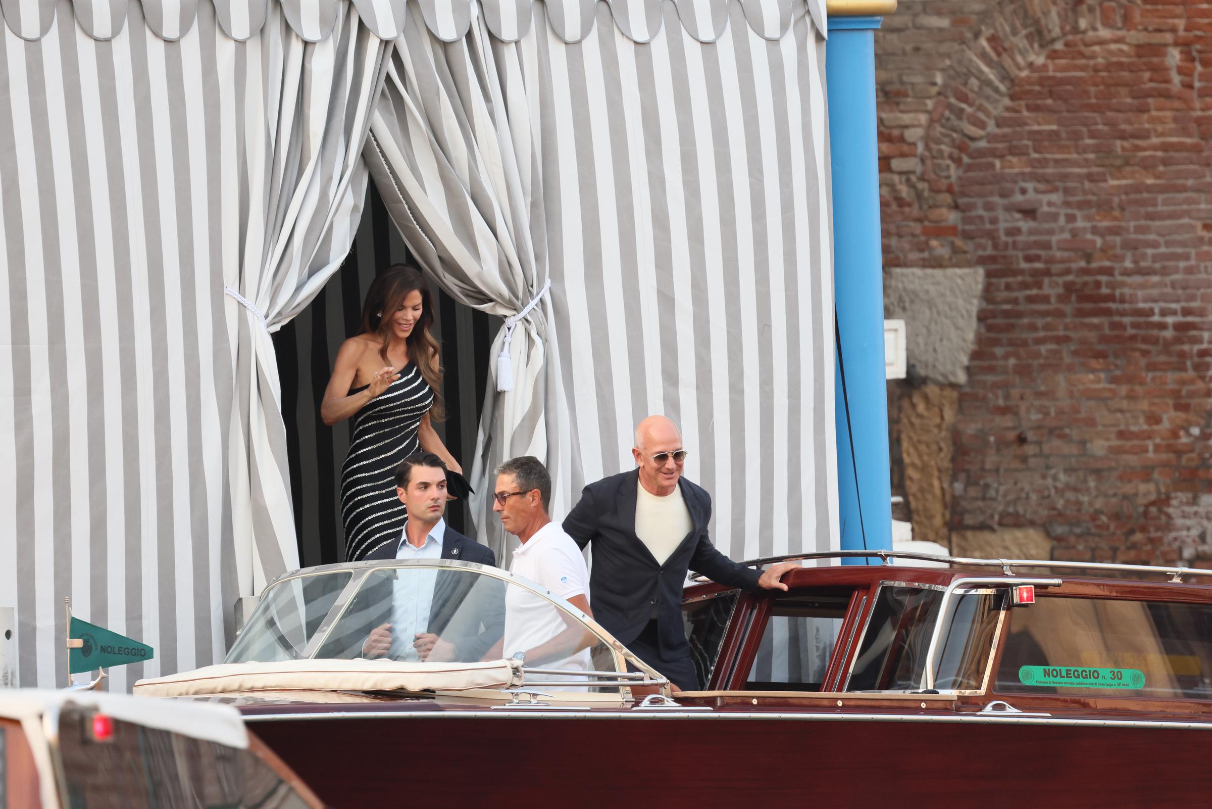 Lauren Sanchez steps out behind Jeff Bezos as he boards a water taxi in Venice, Italy on June 25, 2025, ahead of their wedding festivities | Source: Getty Images