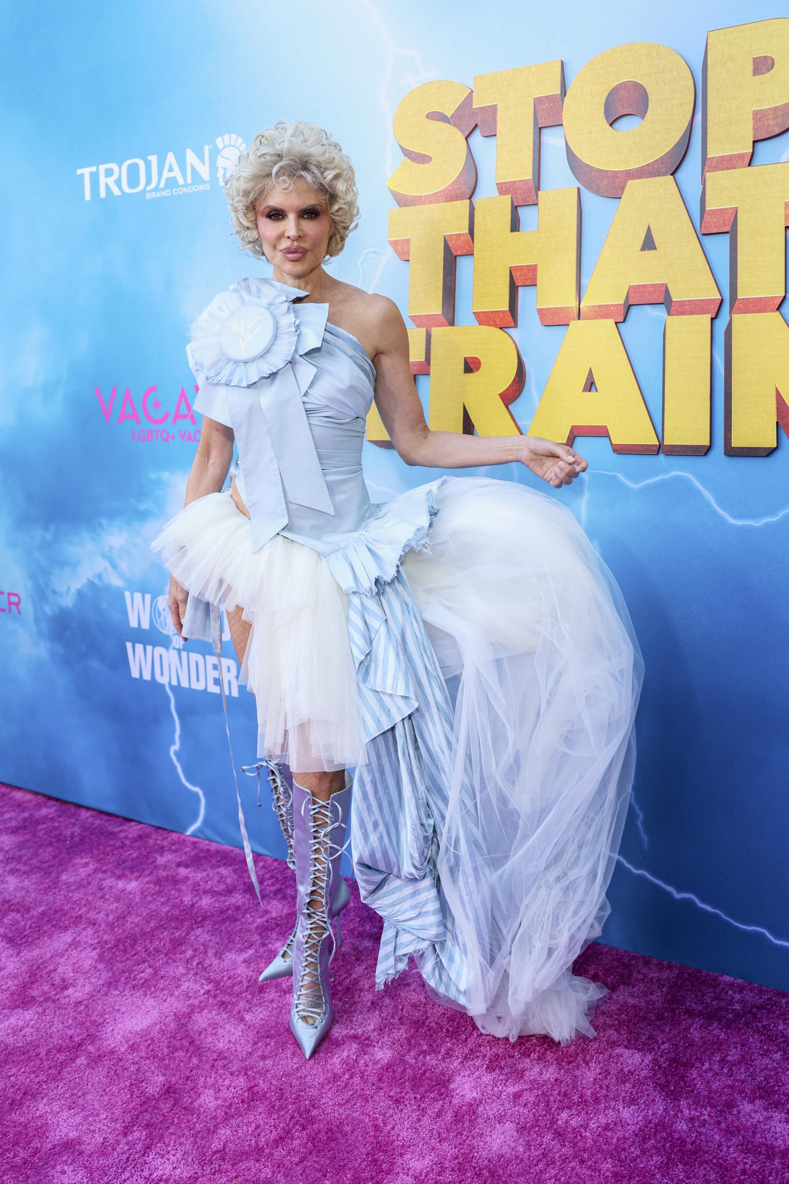 Lisa Rinna arrives in a theatrical look at the "Stop! That! Train!" red carpet | Source: Getty Images