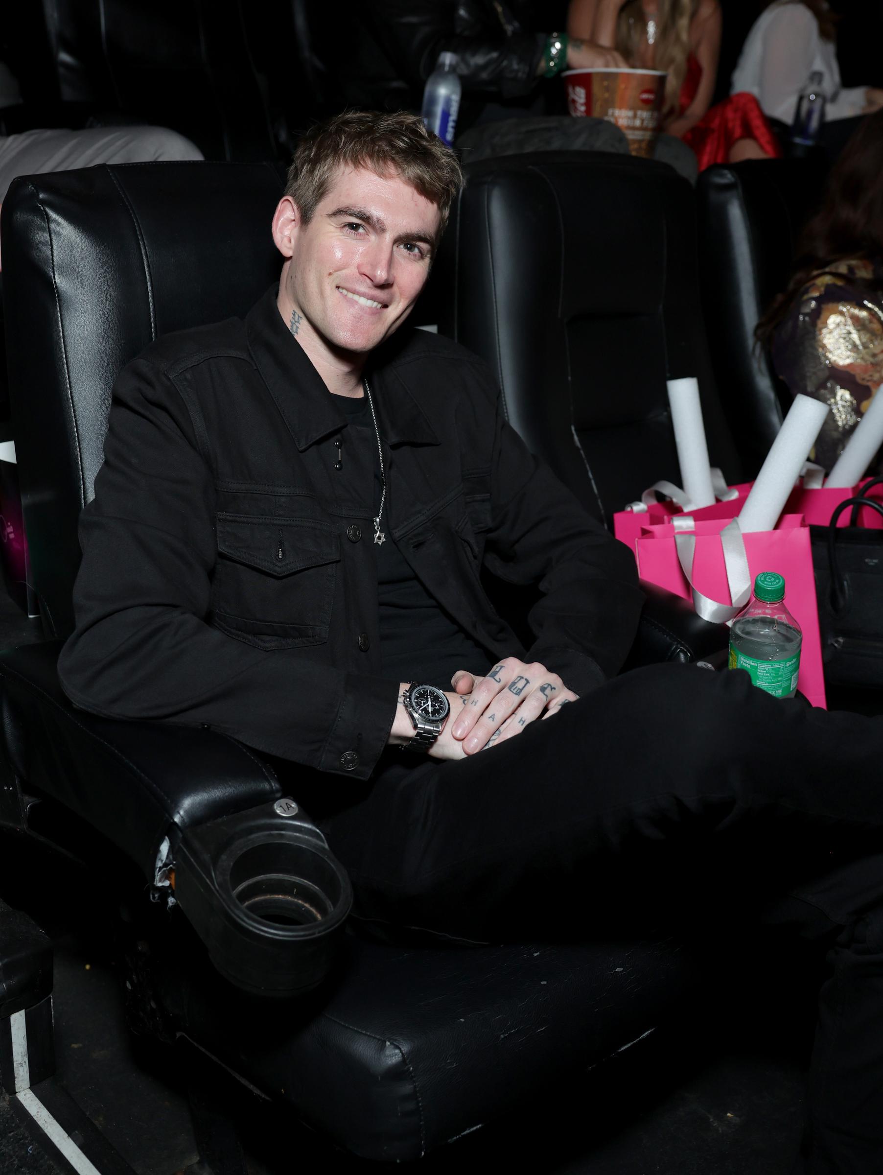 Presley Gerber attends Paris Hilton’s "Infinite Icon: A Visual Memoir" Los Angeles premiere event on January 20, 2026, smiling from his seat at the screening. | Source: Getty Images