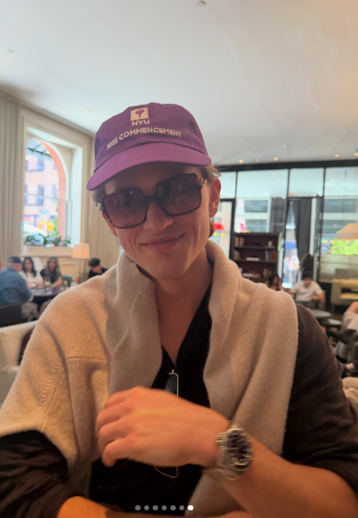 Deacon Phillippe marks his New York University graduation in a purple "NYU 2026 Commencement" cap, celebrating the milestone in a social media post. | Source: Instagram/deaconphillippe
