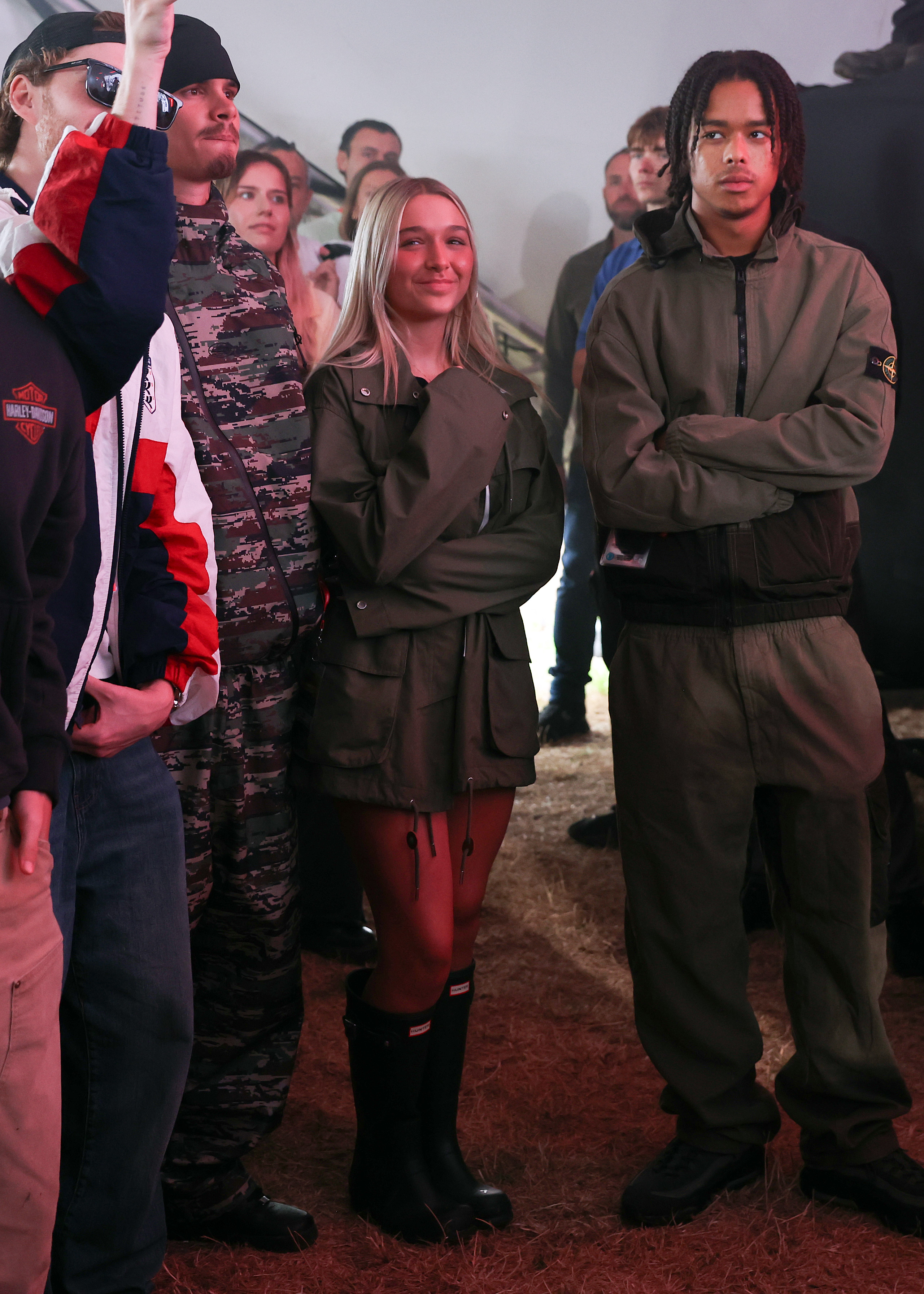 Harper's relaxed festival ensemble showed how easily she can move between polished family-event dressing and more practical, laid-back fashion, with her Wellington boots adding a distinctly festival-ready touch. | Source: Getty Images
