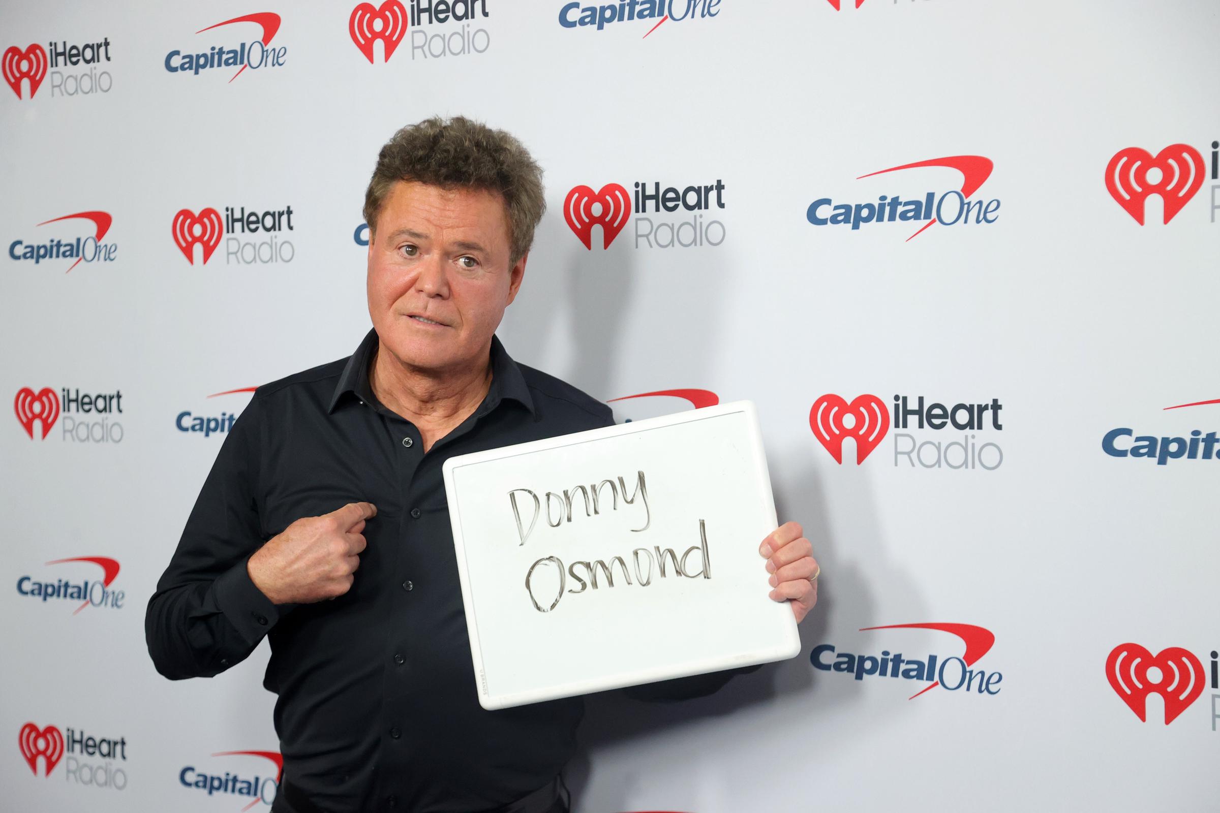 After more than six decades in show business, Donny has found an unusual way to connect his early career with the next generation of his family. His Las Vegas performances have featured an AI-generated version of his teenage self, created with the help of his grandson Daxton. | Source: Getty Images