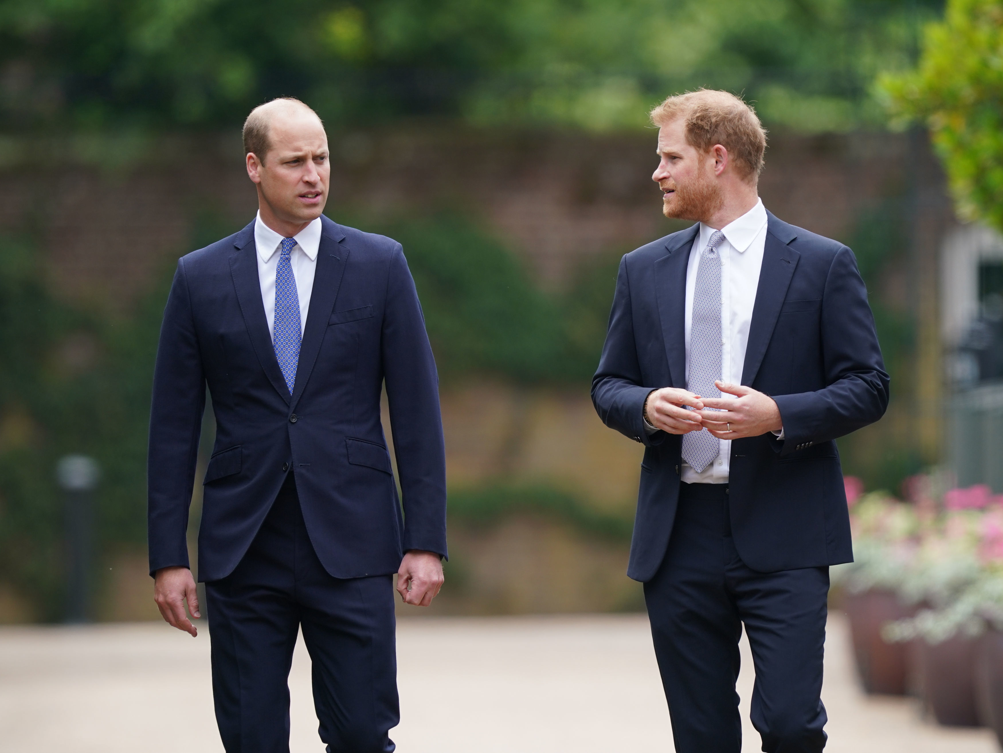Prince William and Prince Harry appeared together at Kensington Palace in July 2021 to unveil a statue honoring their late mother, Princess Diana. Their relationship has since remained strained, with the brothers currently reported to have no direct communication. | Source: Getty Images